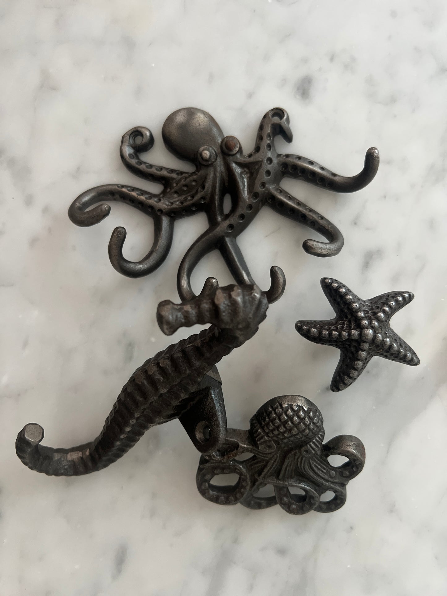 Cast octopus door hook