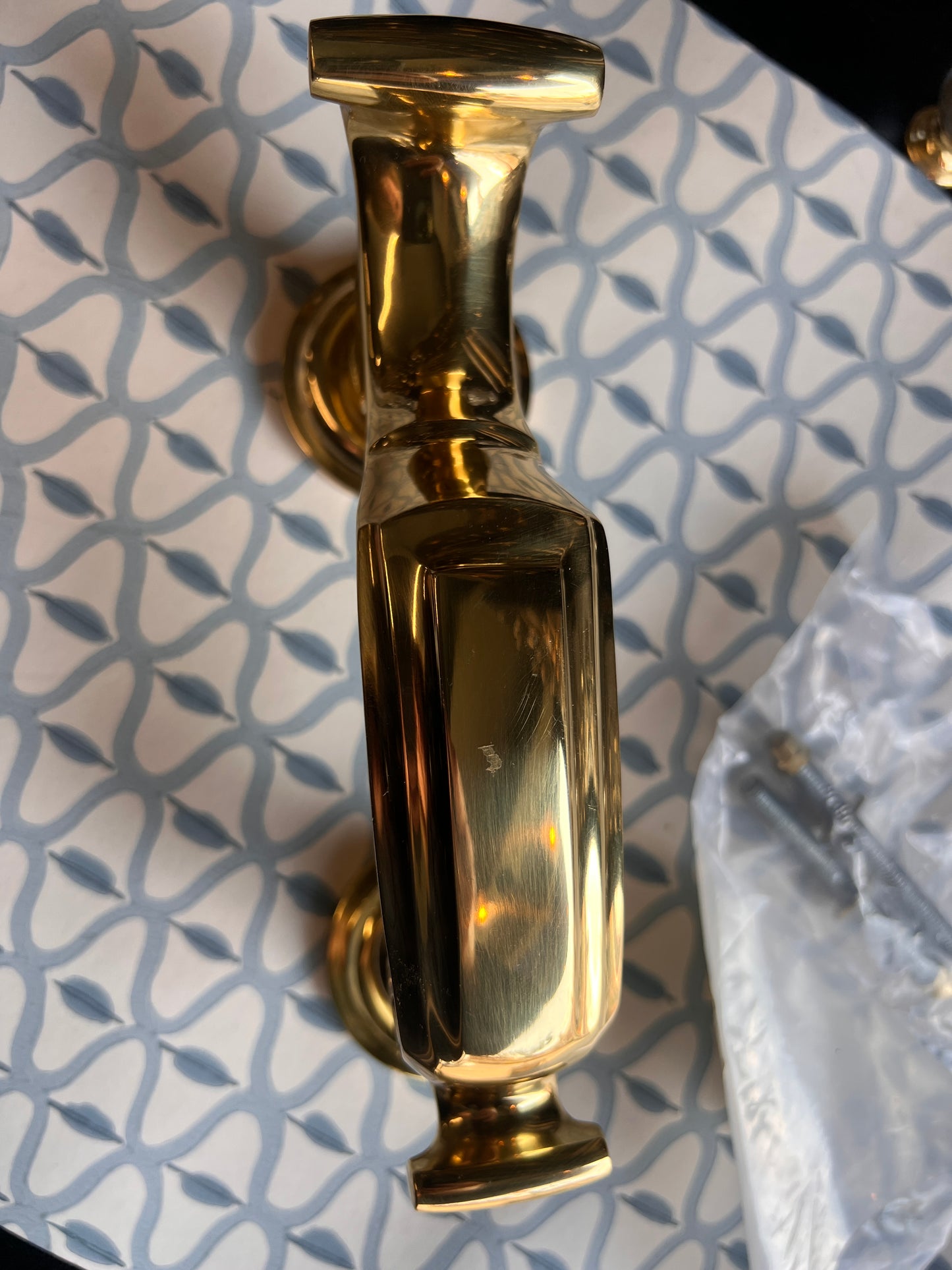 Polished brass heavy duty door knocker slight mark