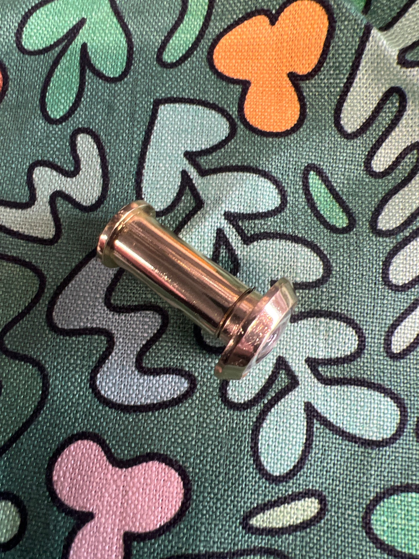 Polished brass door viewer
