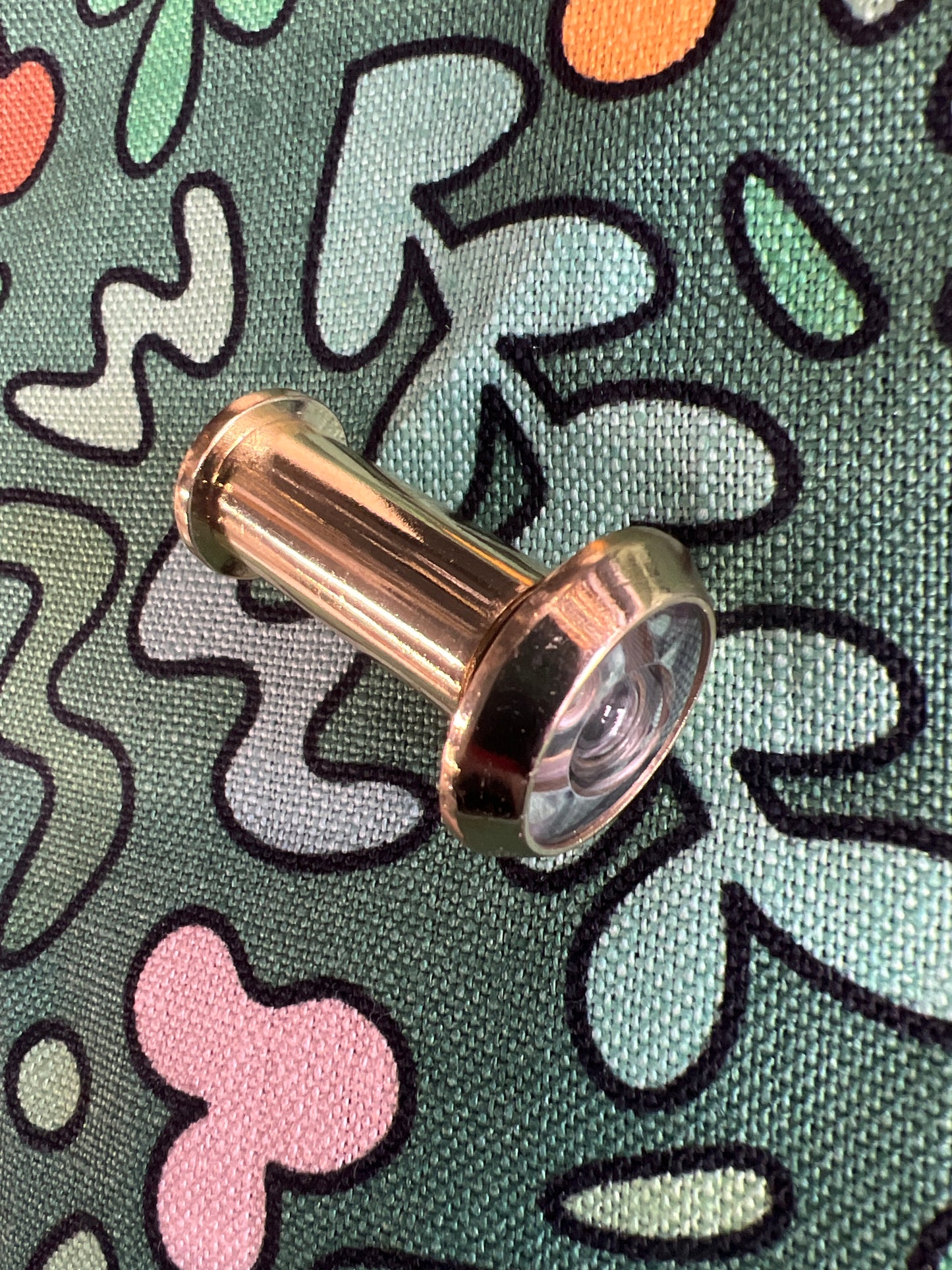 Polished brass door viewer