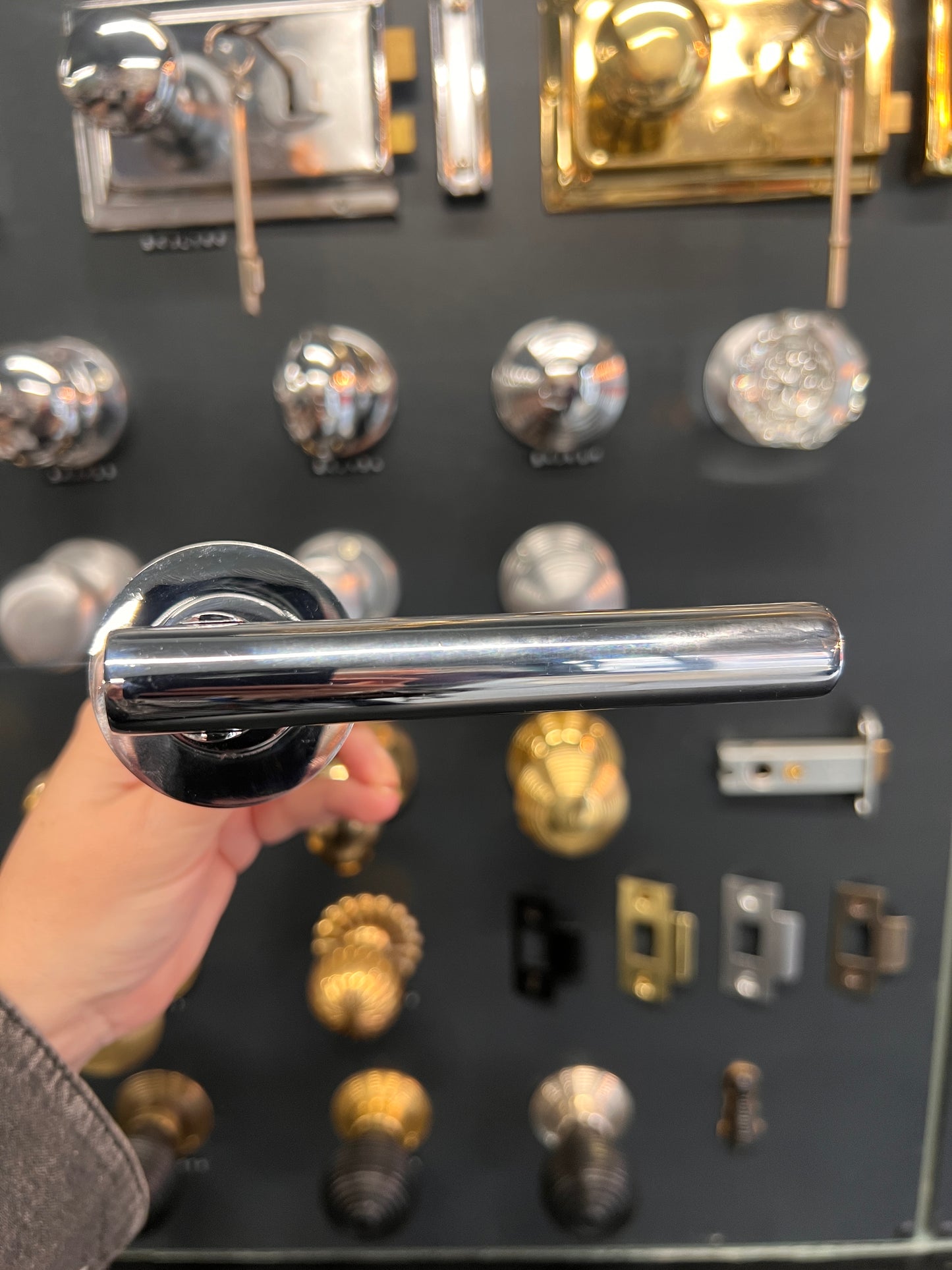 Polished chrome straight lever on rose handles