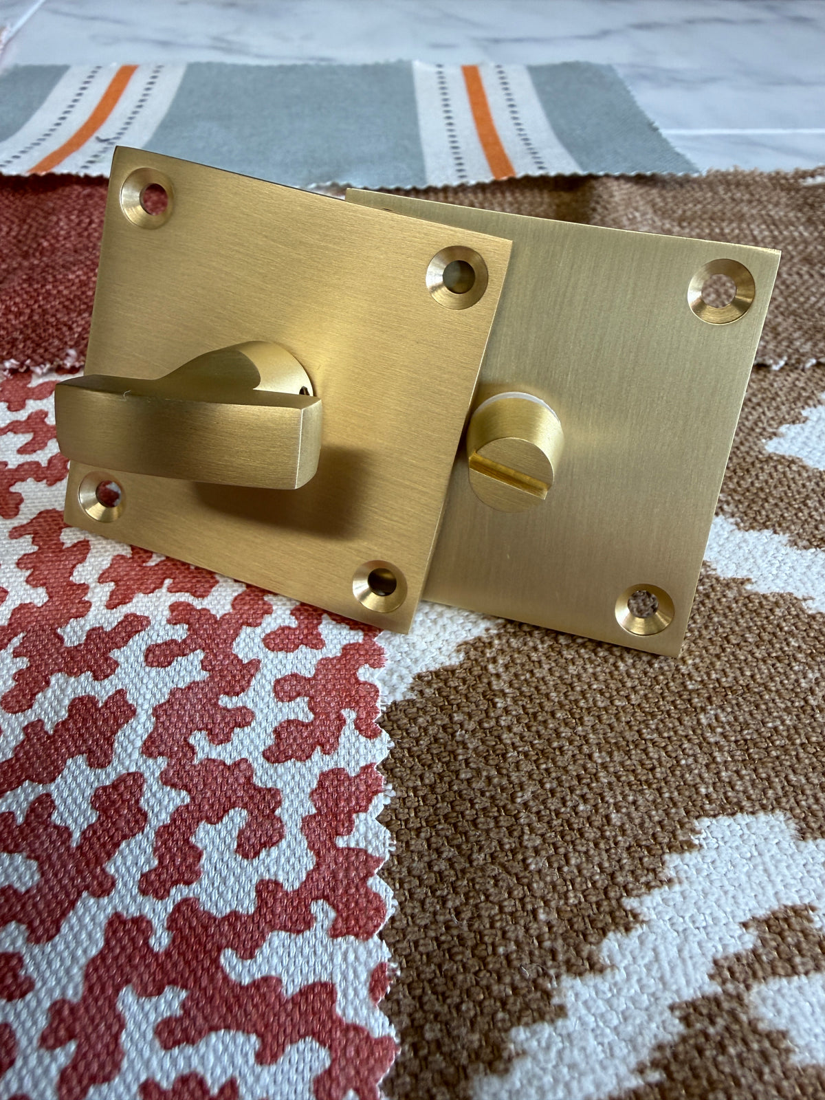 Satin brass flat plate bathroom turn and release