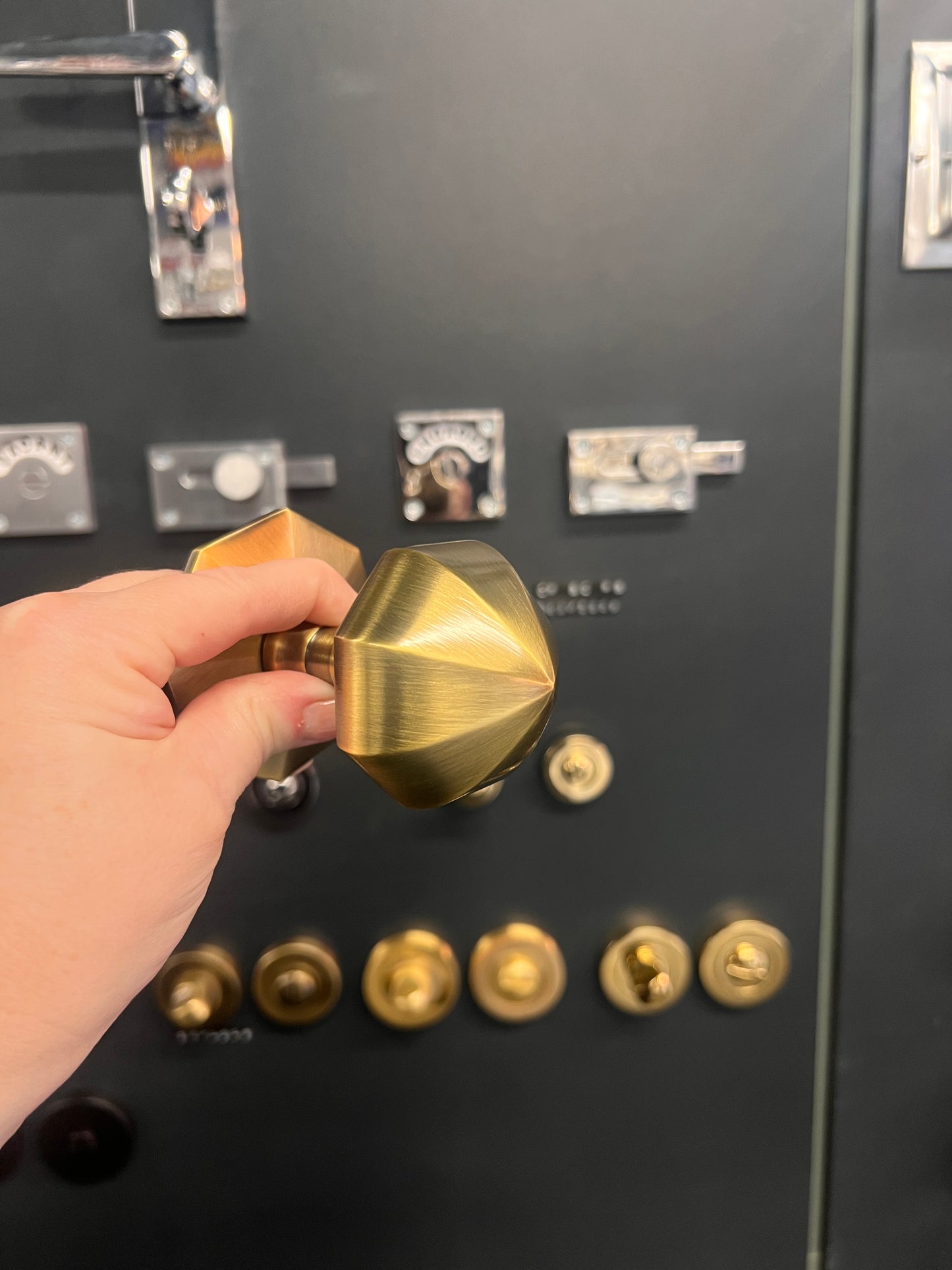 Antique brass faceted centre door knob