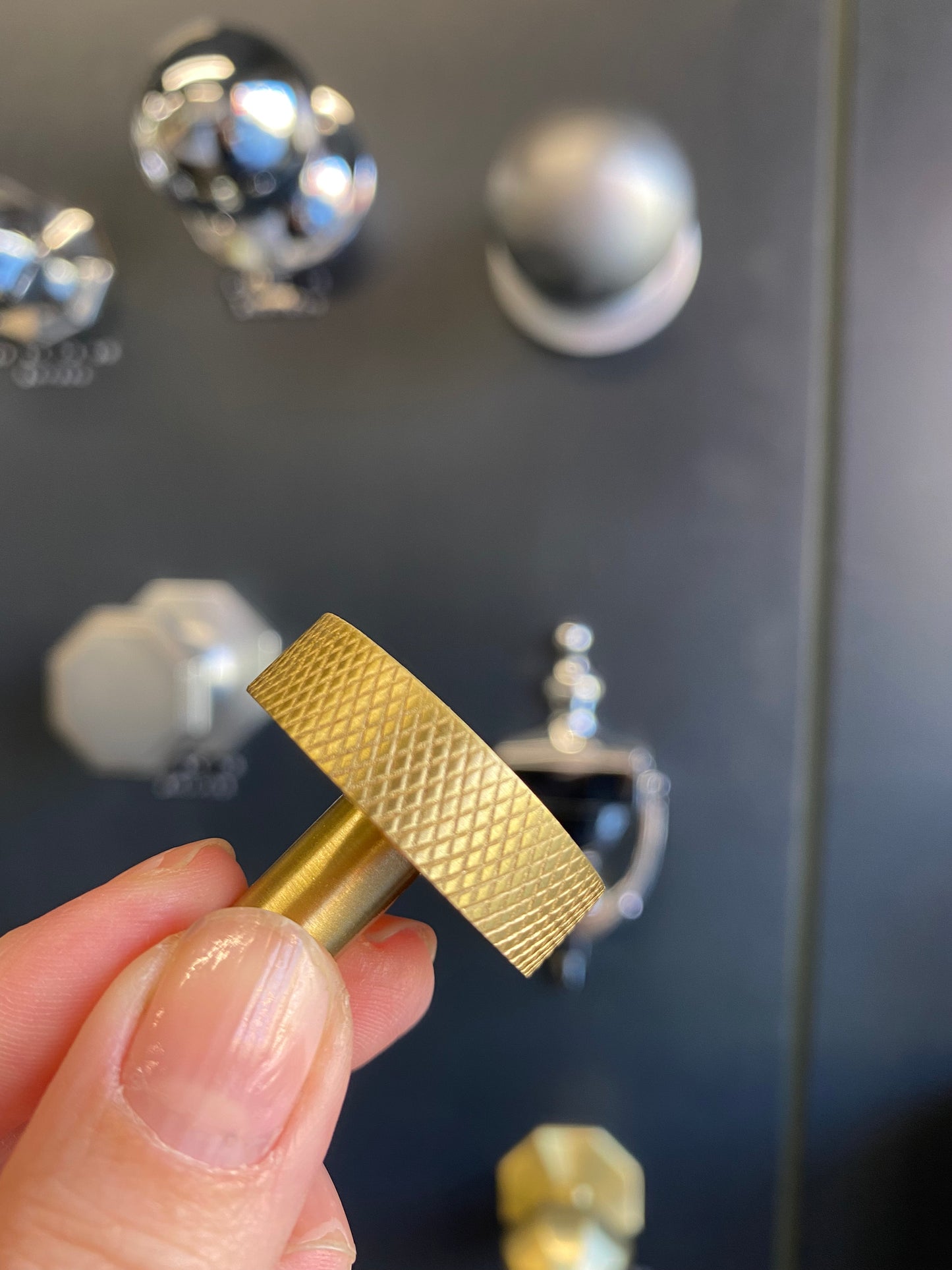 Round satin brass cupboard knob with knurled detail