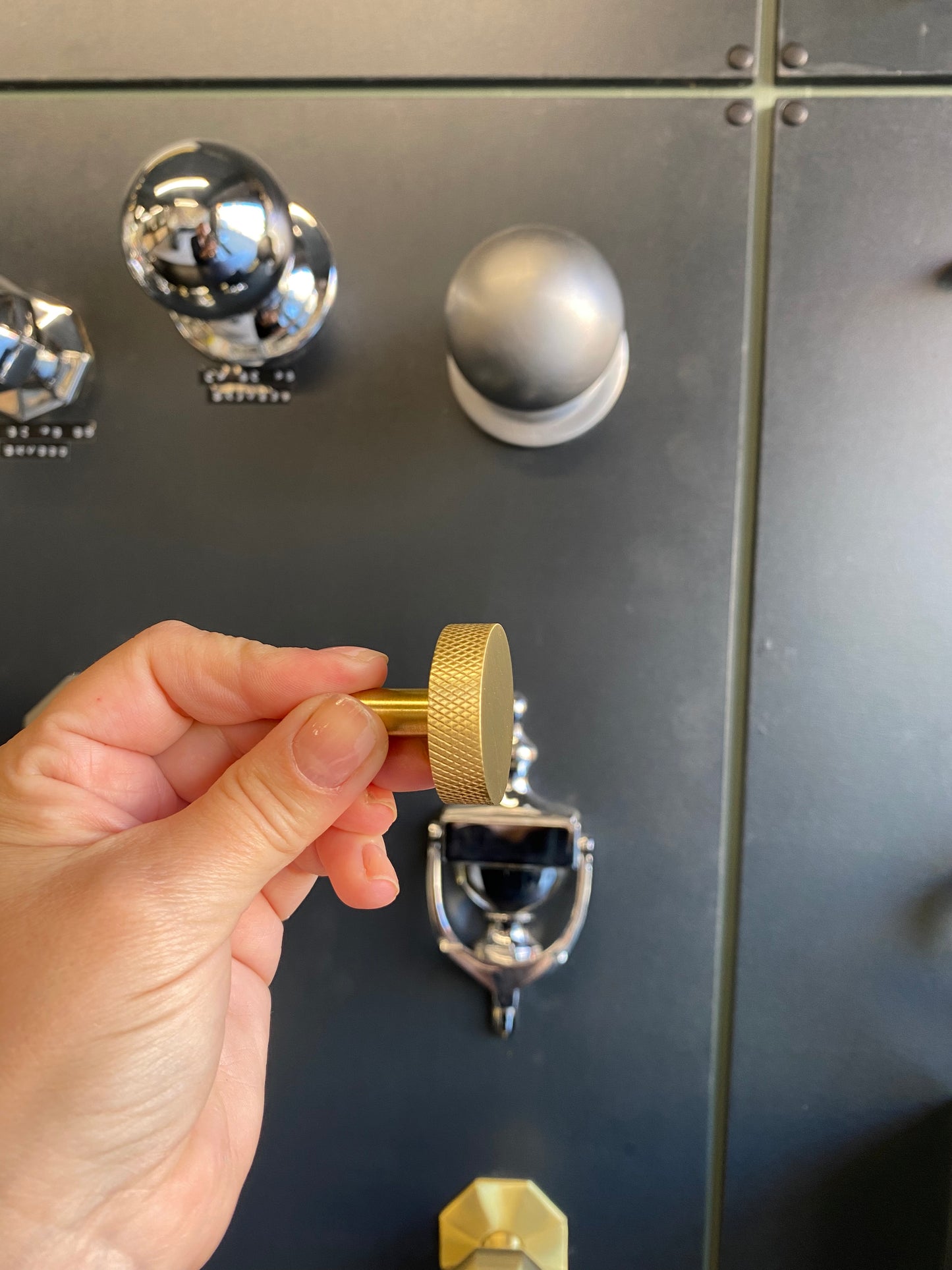 Round satin brass cupboard knob with knurled detail