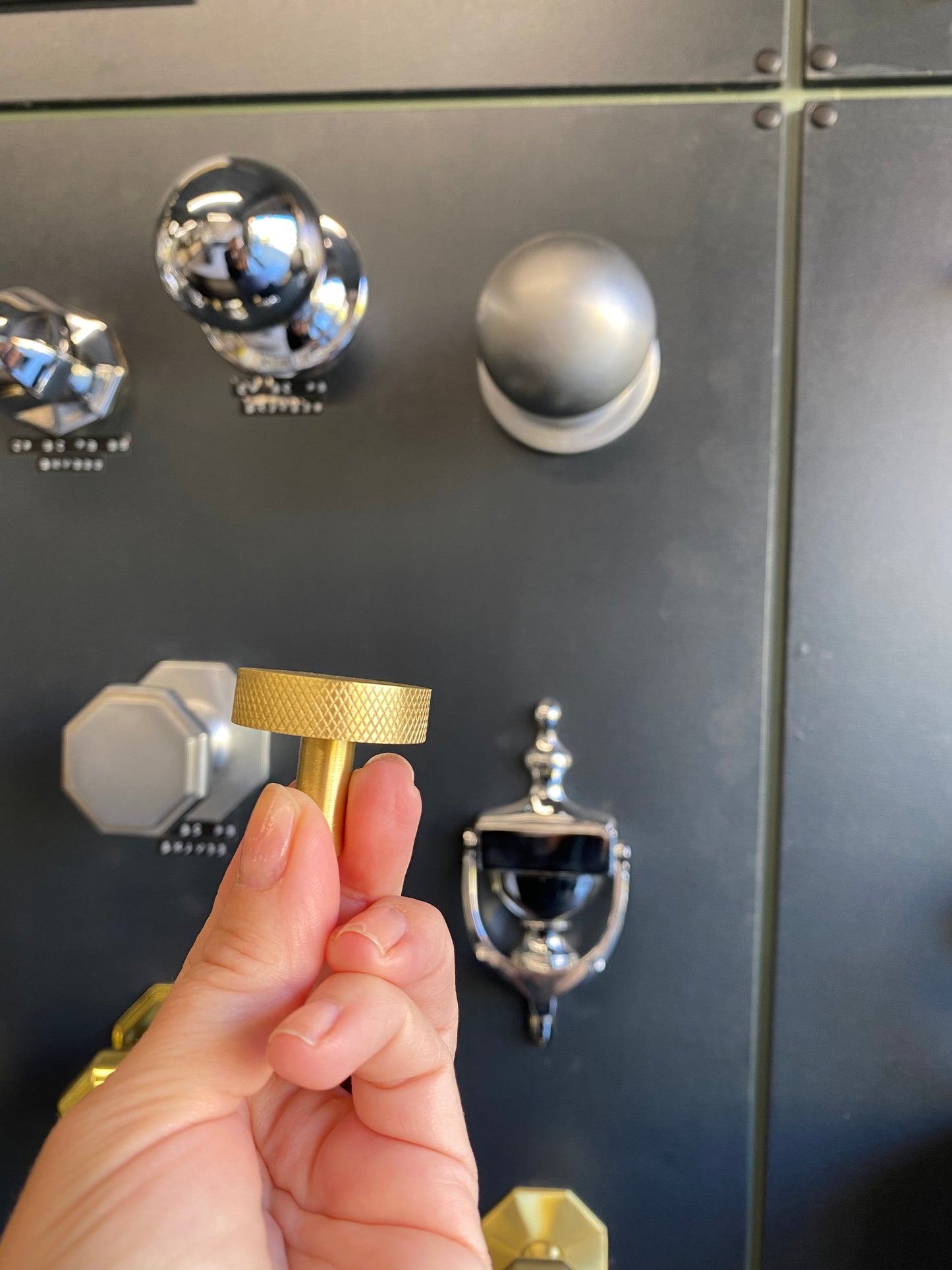 Round satin brass cupboard knob with knurled detail