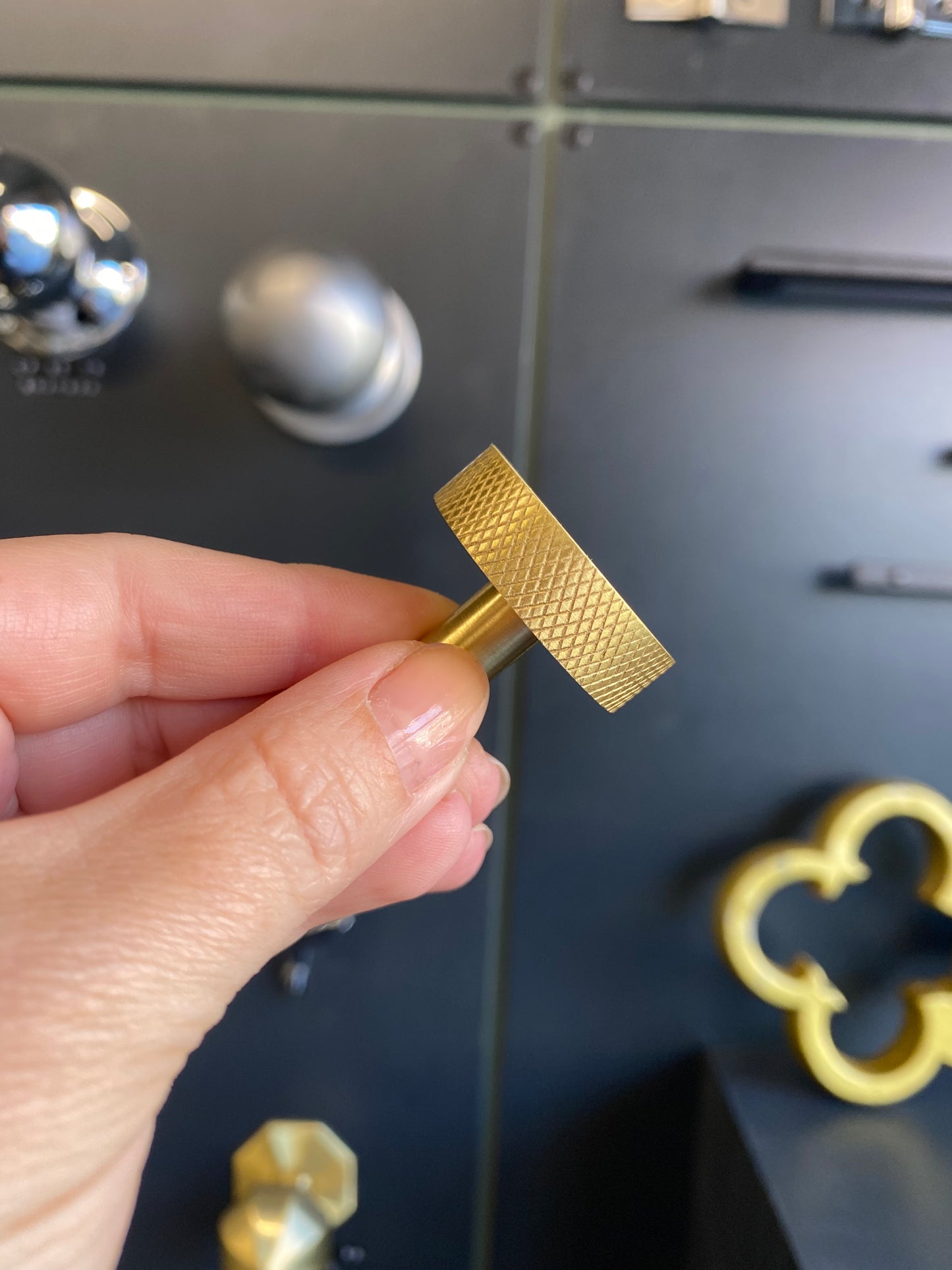 Round satin brass cupboard knob with knurled detail