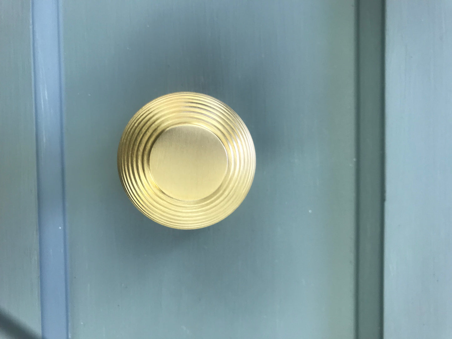 Satin brass reeded mortice knobs