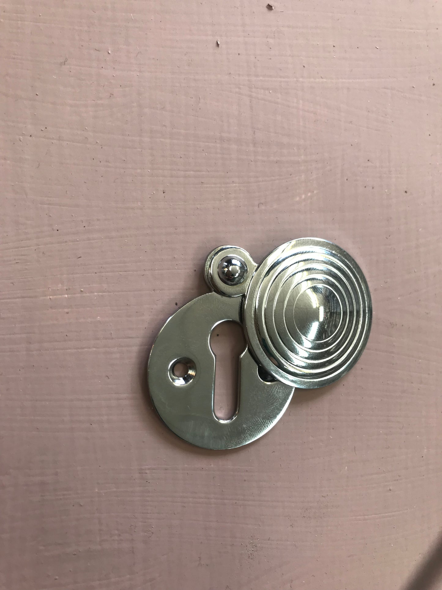 Polished chrome reeded escutcheon