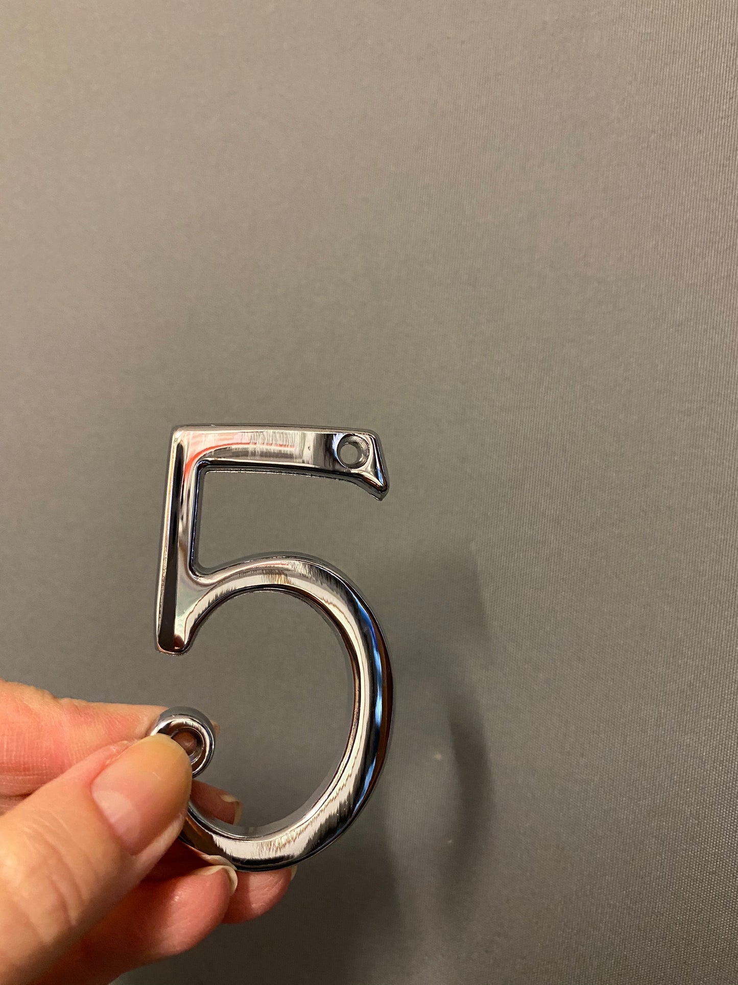 Polished chrome “5”