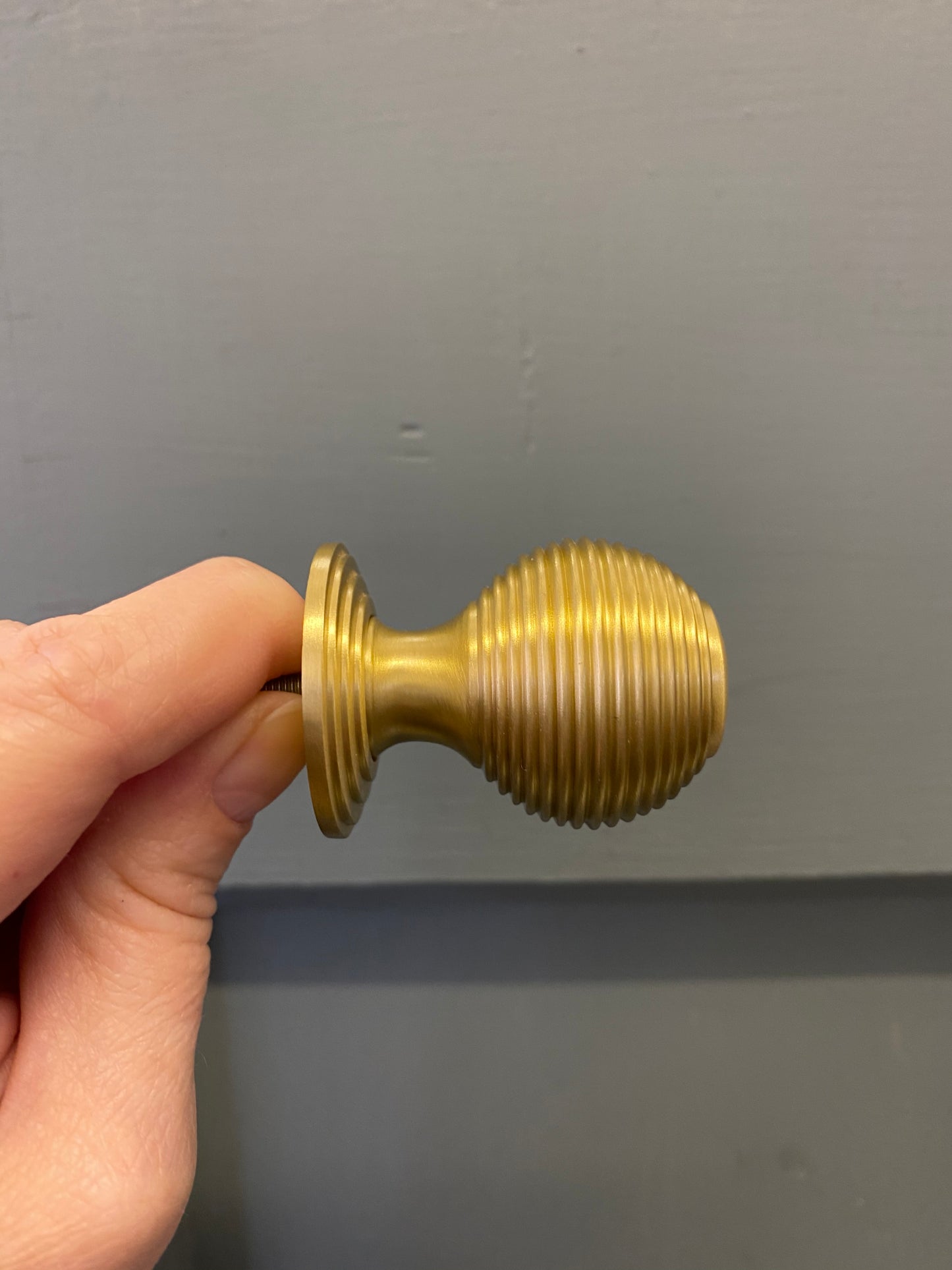 Reeded satin brass cupboard knob