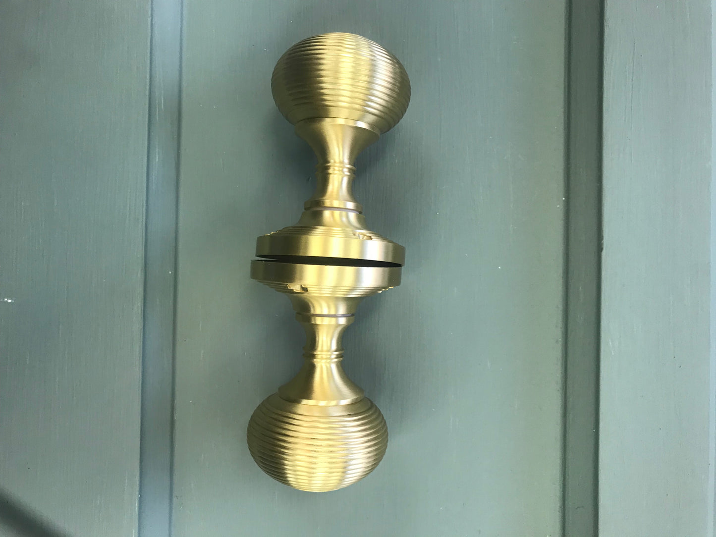 Satin brass reeded mortice knobs