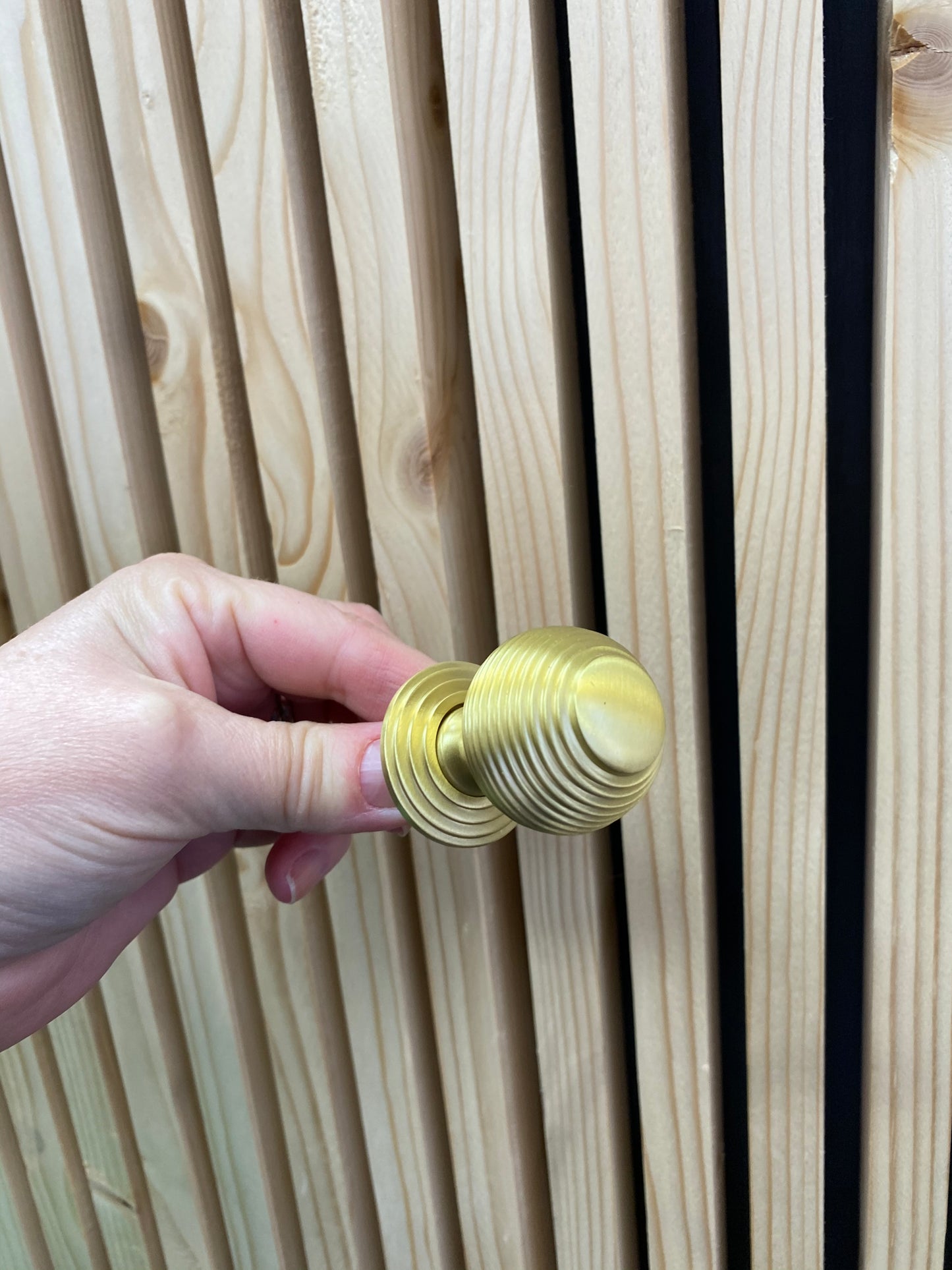 Reeded satin brass cupboard knob