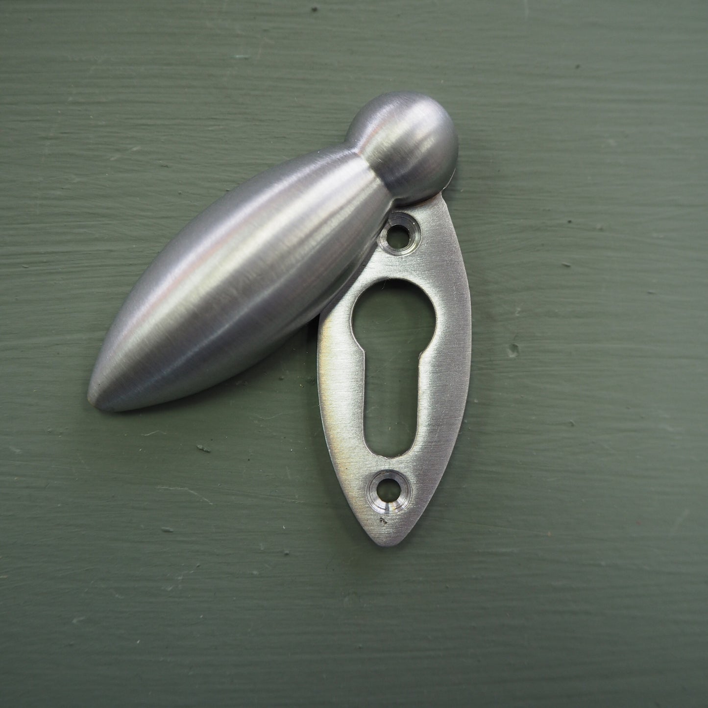 Satin chrome tear drop escutcheon