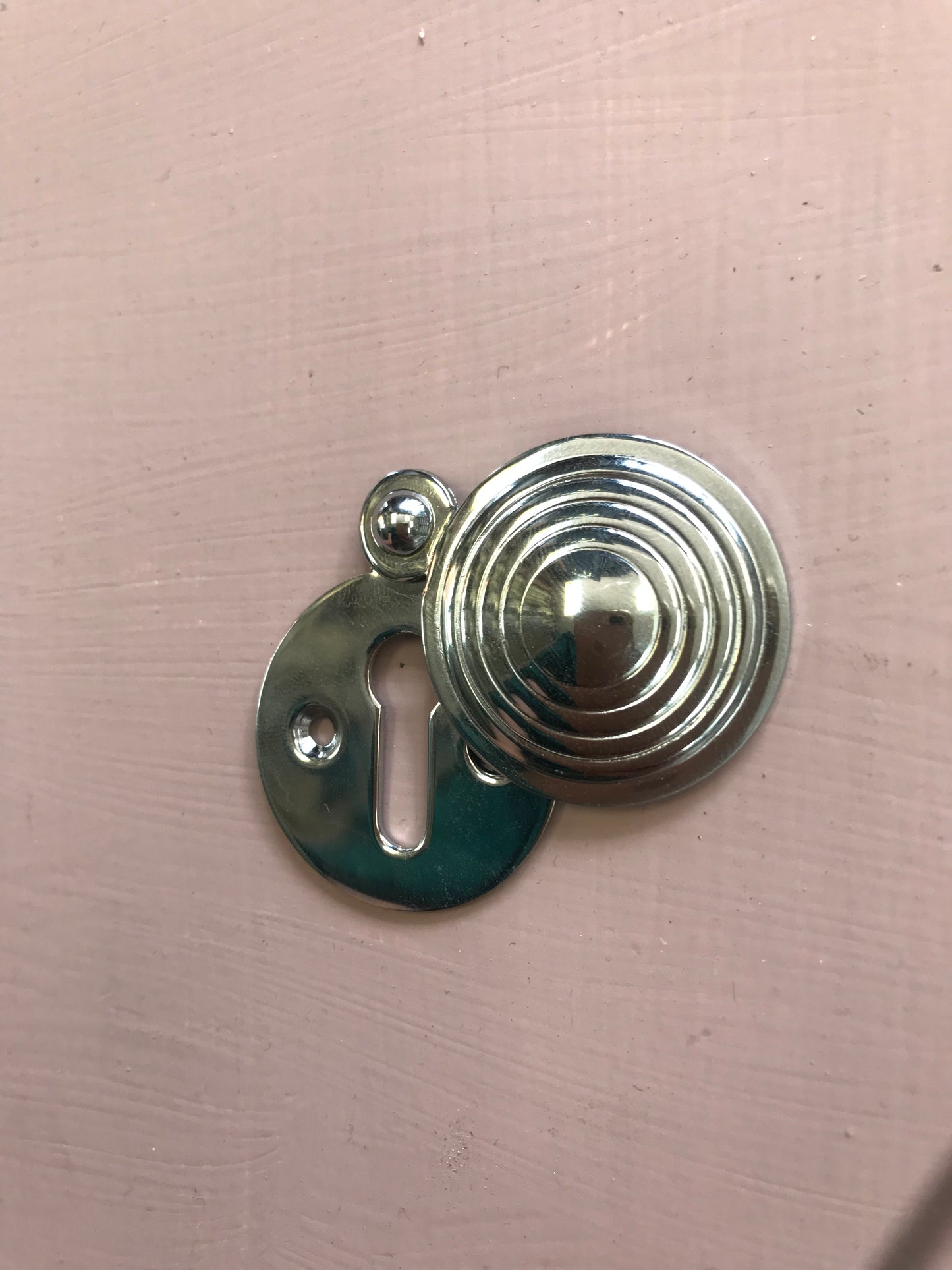 Polished chrome reeded escutcheon