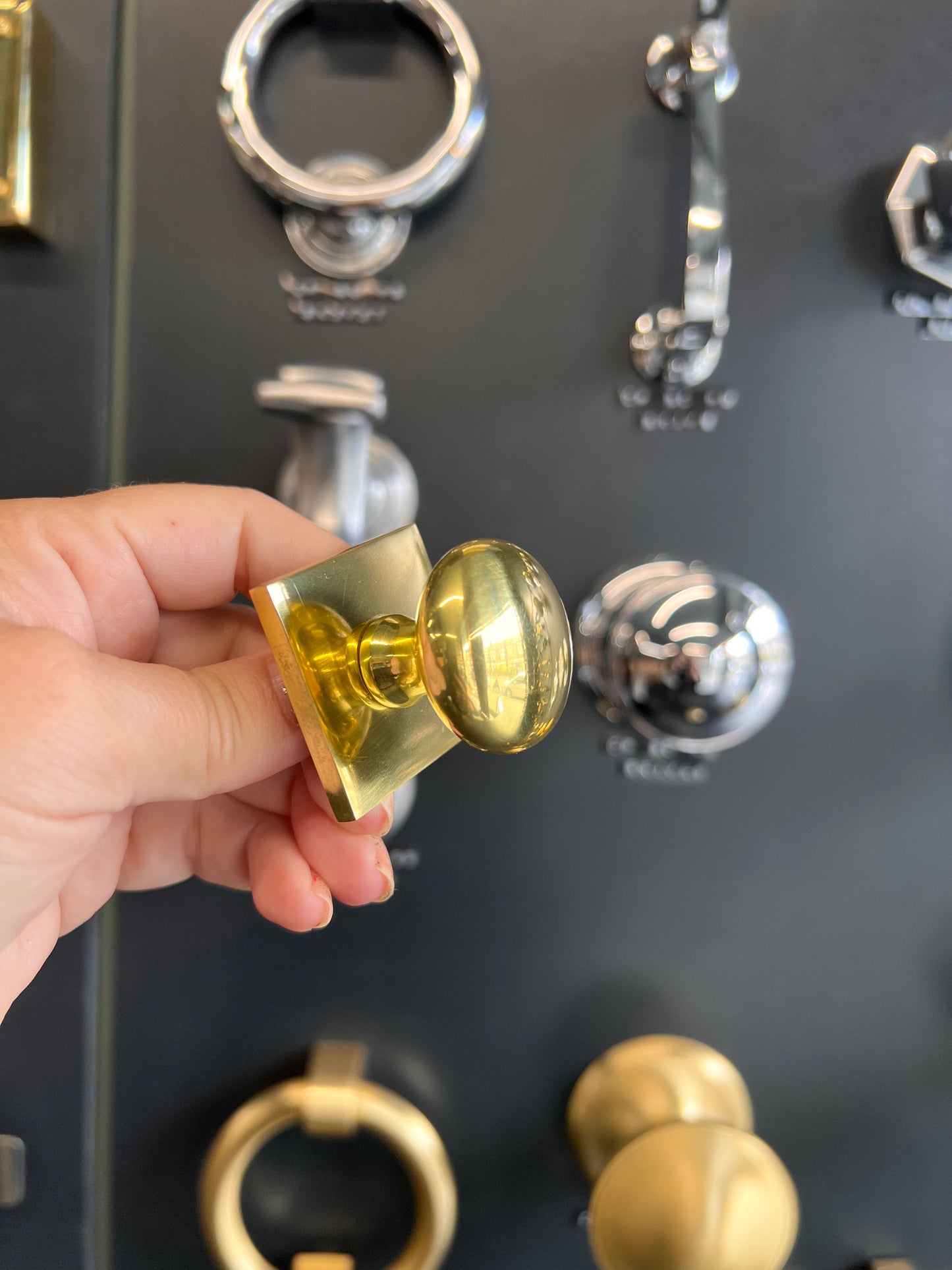 Victorian round cabinet knob with square backplate in polished brass