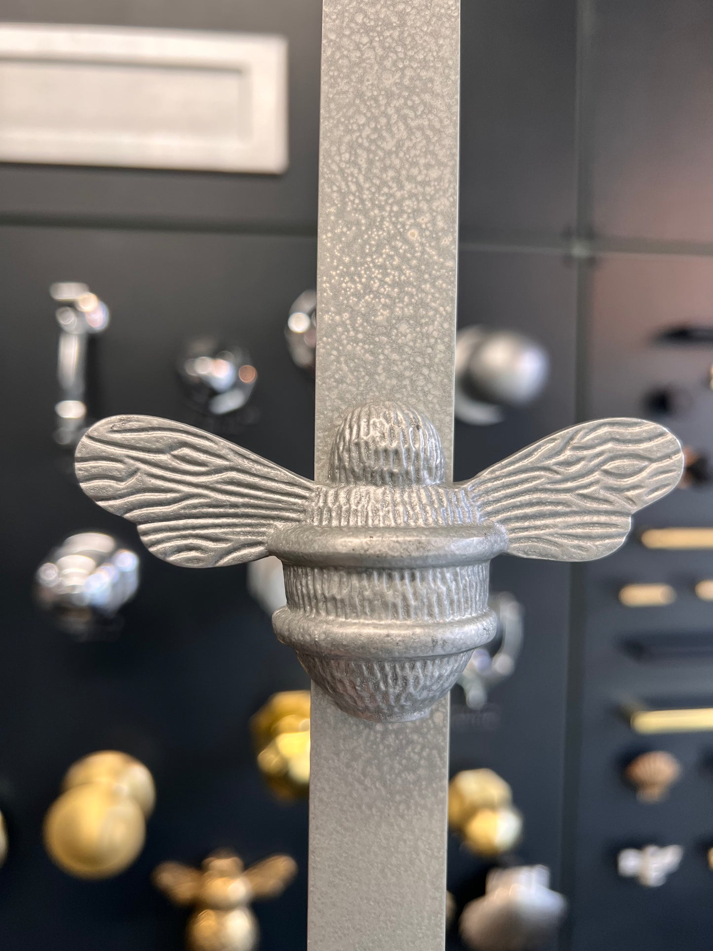 Grey bee wreath hanger