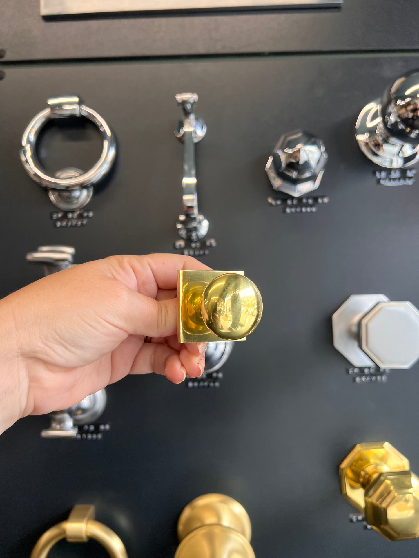 Victorian round cabinet knob with square backplate in polished brass
