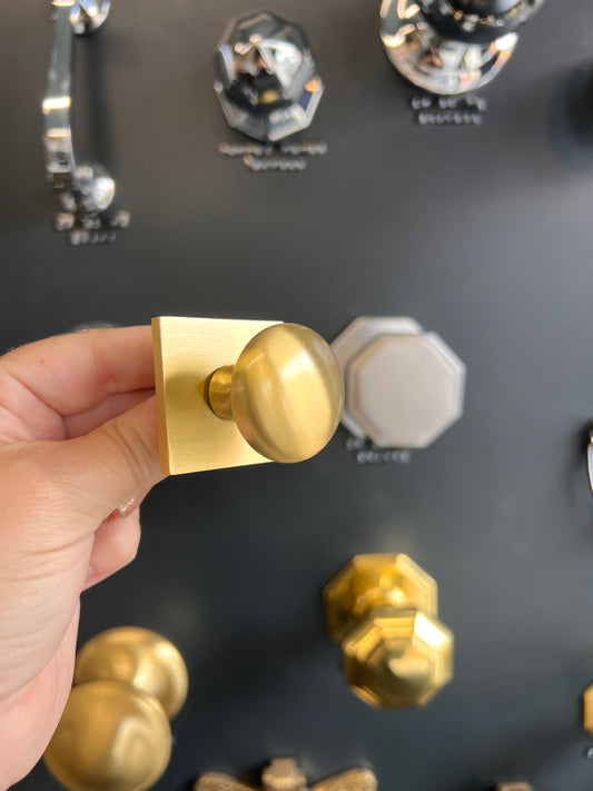 Victorian round cabinet knob with square backplate in satin brass