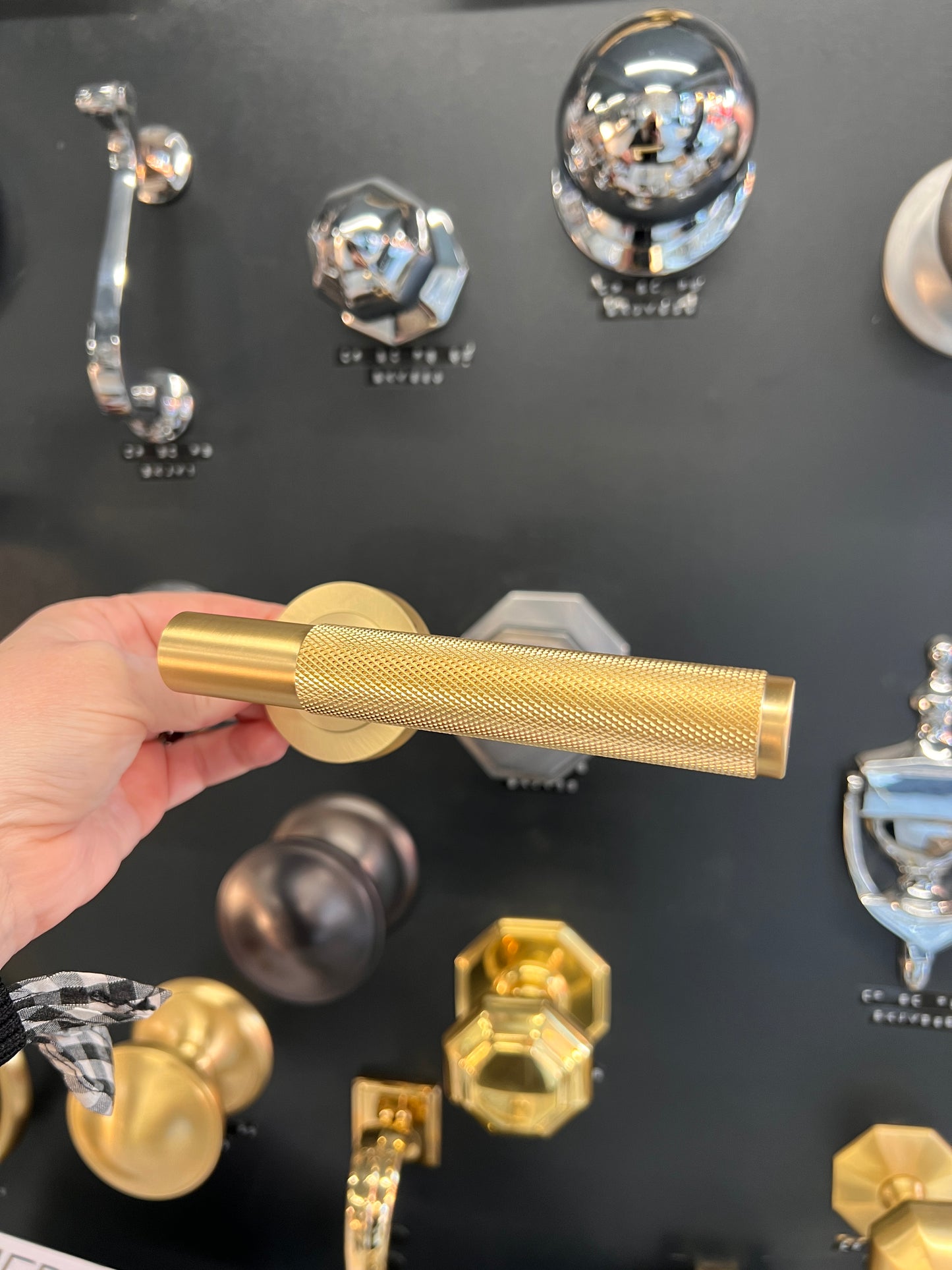 Satin brass knurled pair of lever handles
