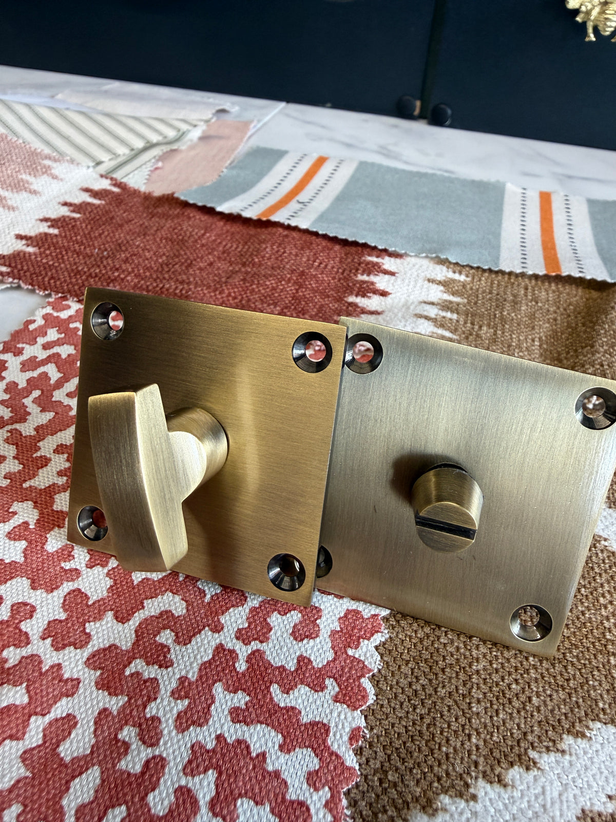 Antique brass flat plate bathroom turn and release