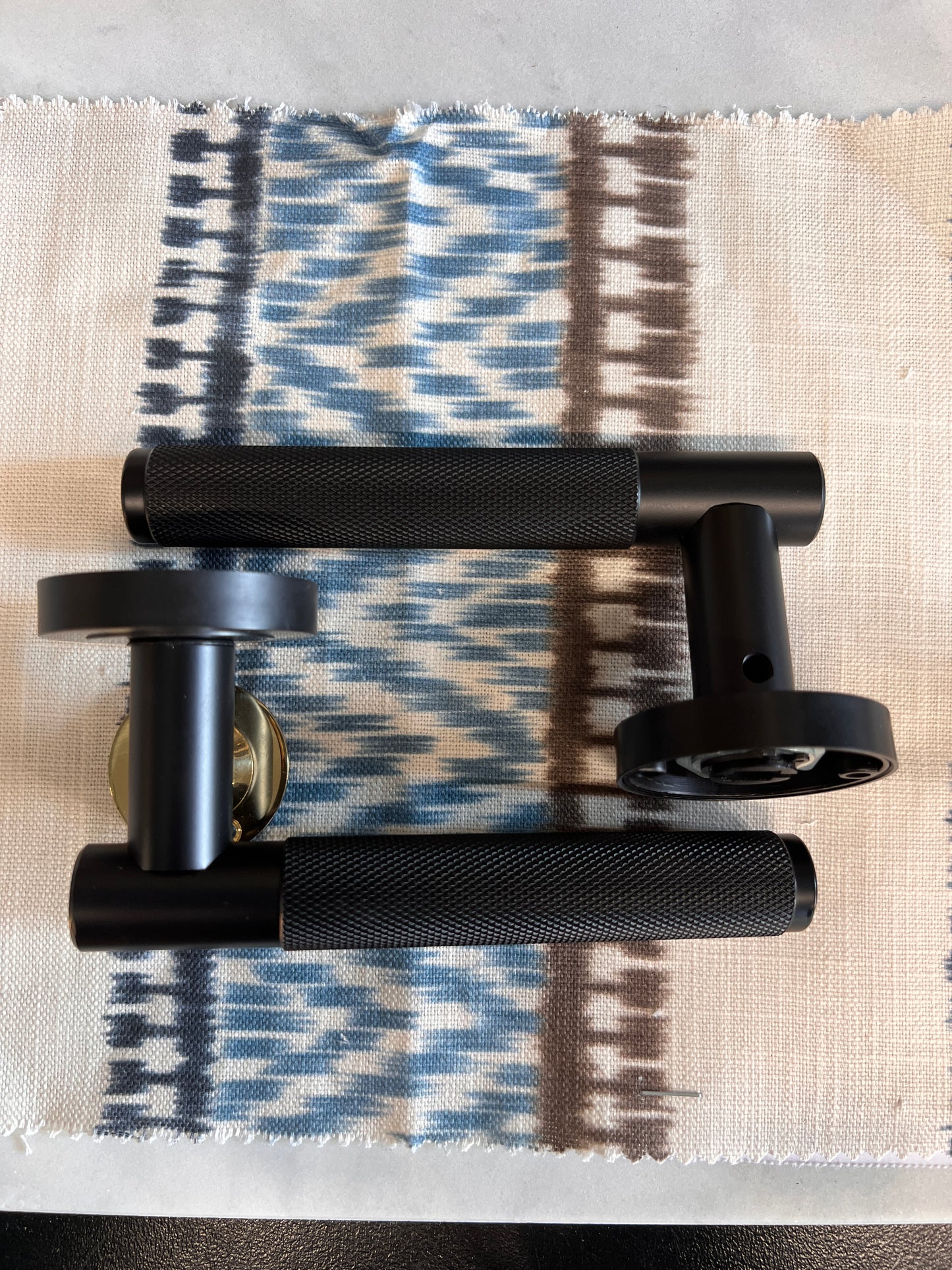 Matt black knurled pair of lever handles