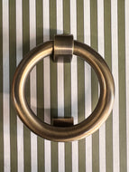 Antique brass ring door knocker