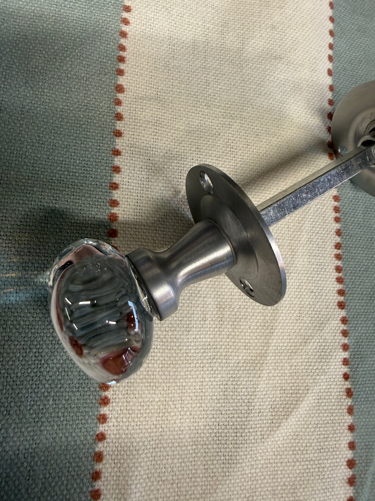 Oval glass bathroom turn and release in satin chrome