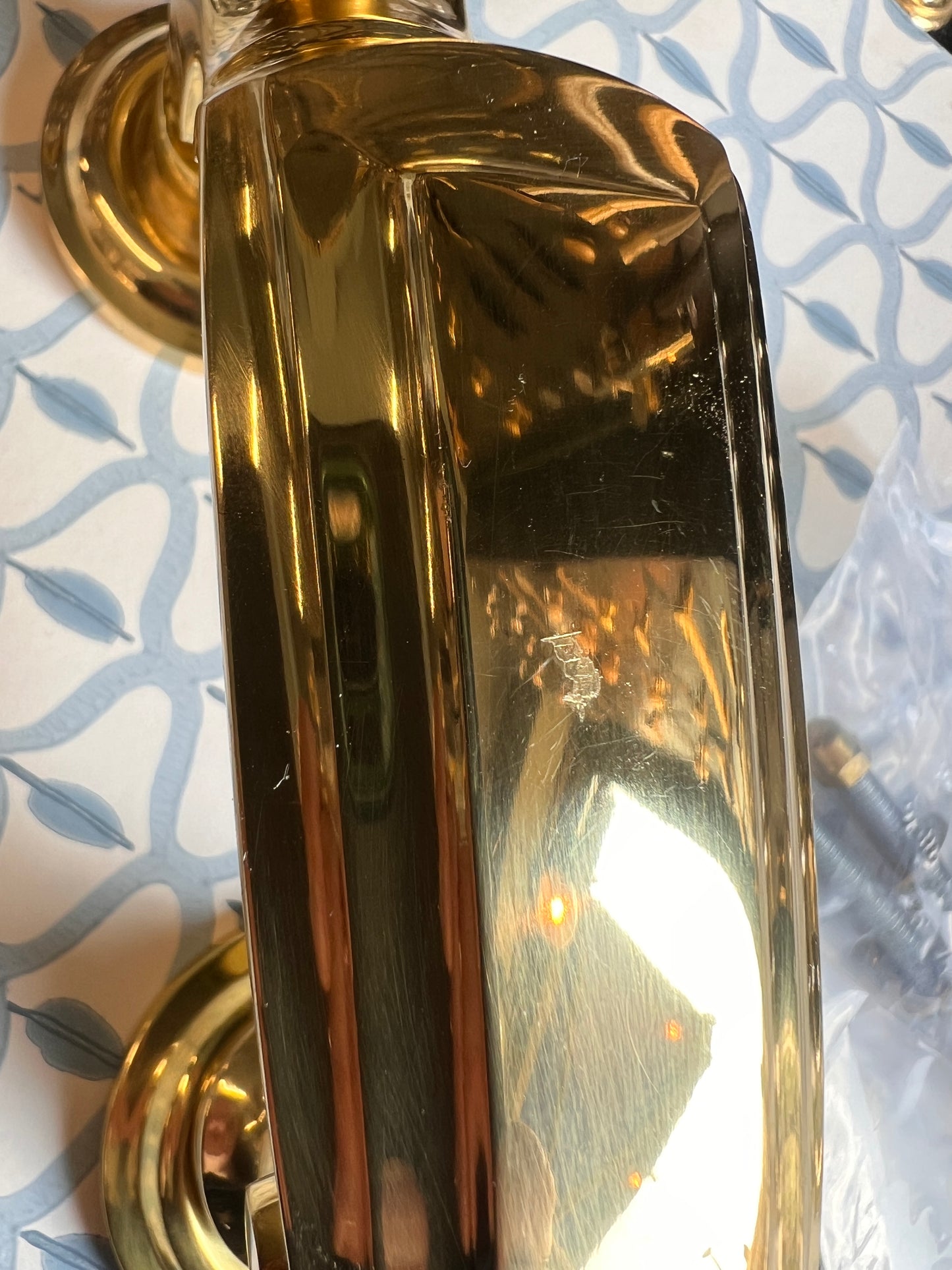 Polished brass heavy duty door knocker slight mark
