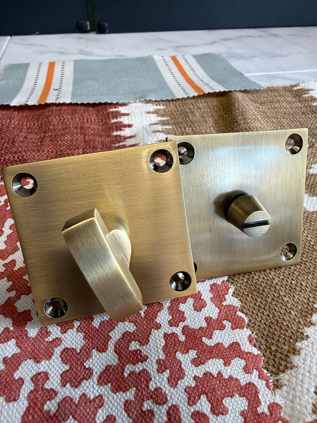 Antique brass flat plate bathroom turn and release