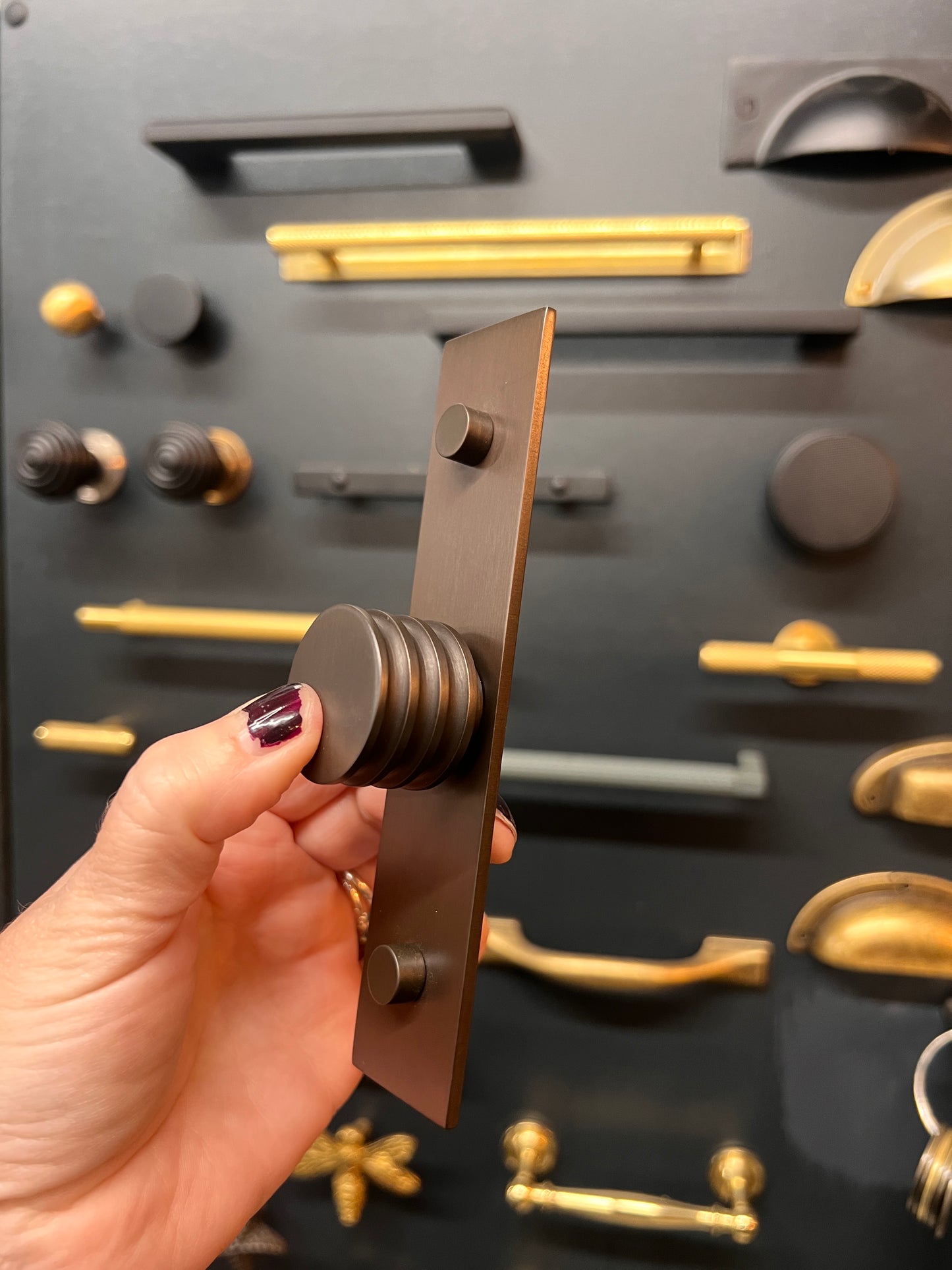 Dark bronze sturt cabinet knob on plain backplate