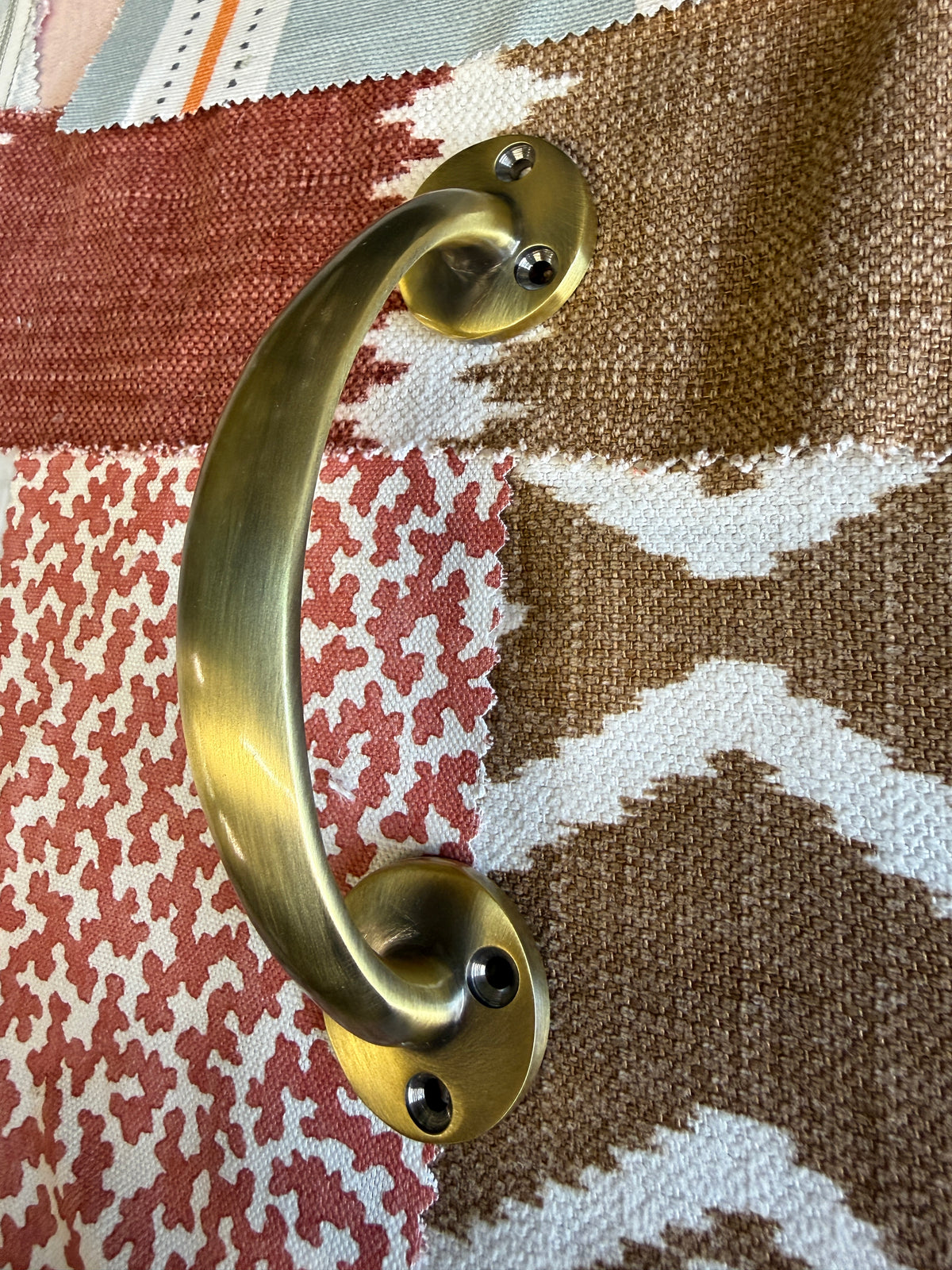 Antique brass bow handle