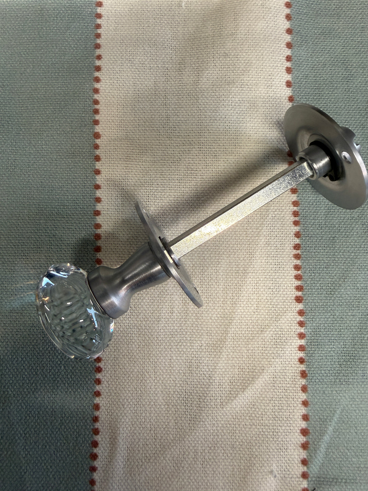 Oval glass bathroom turn and release in satin chrome