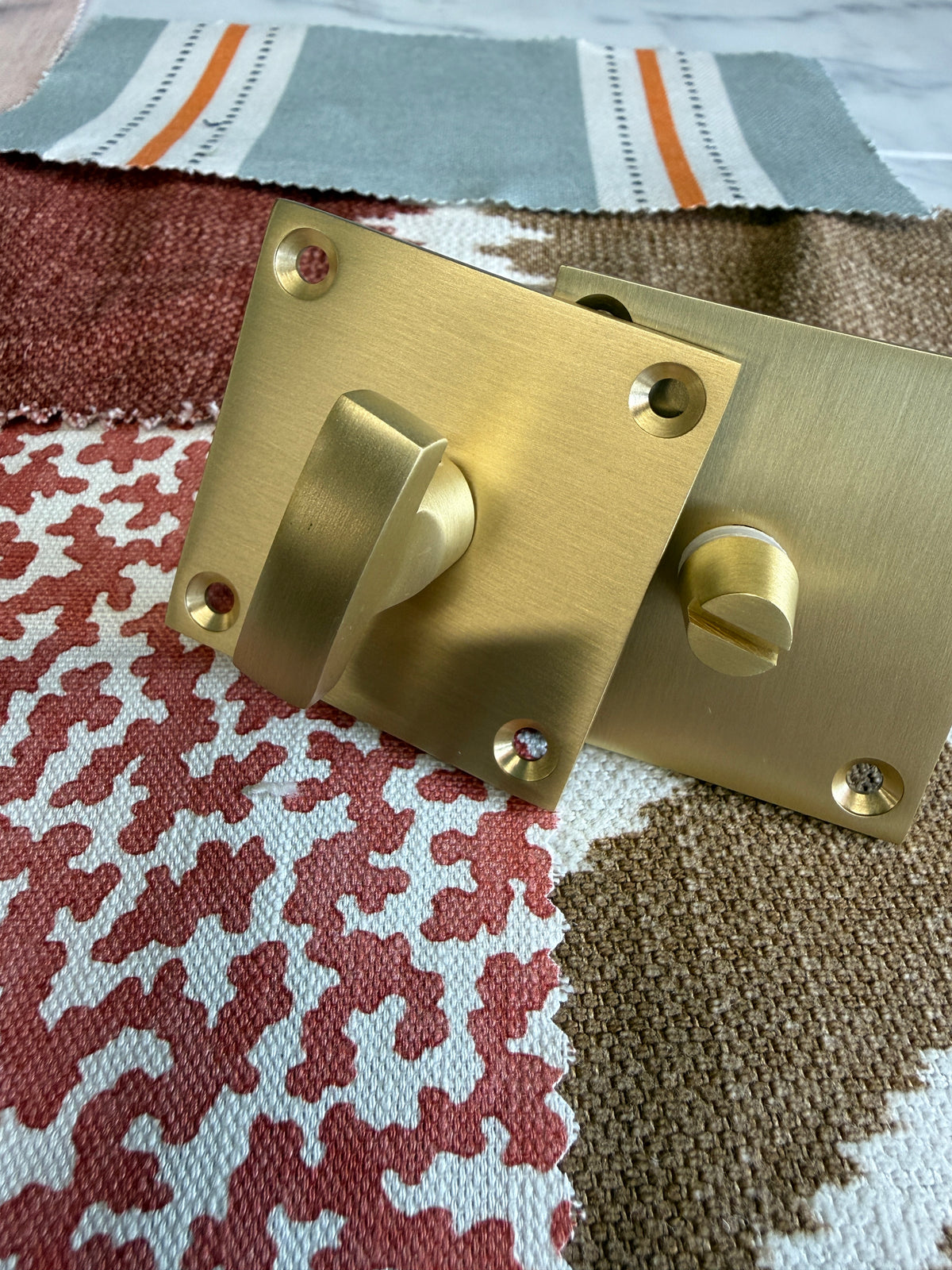 Satin brass flat plate bathroom turn and release
