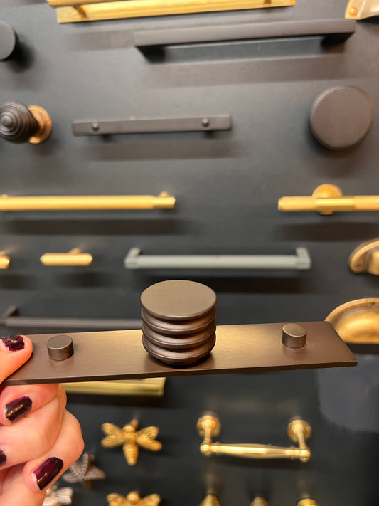 Dark bronze sturt cabinet knob on plain backplate