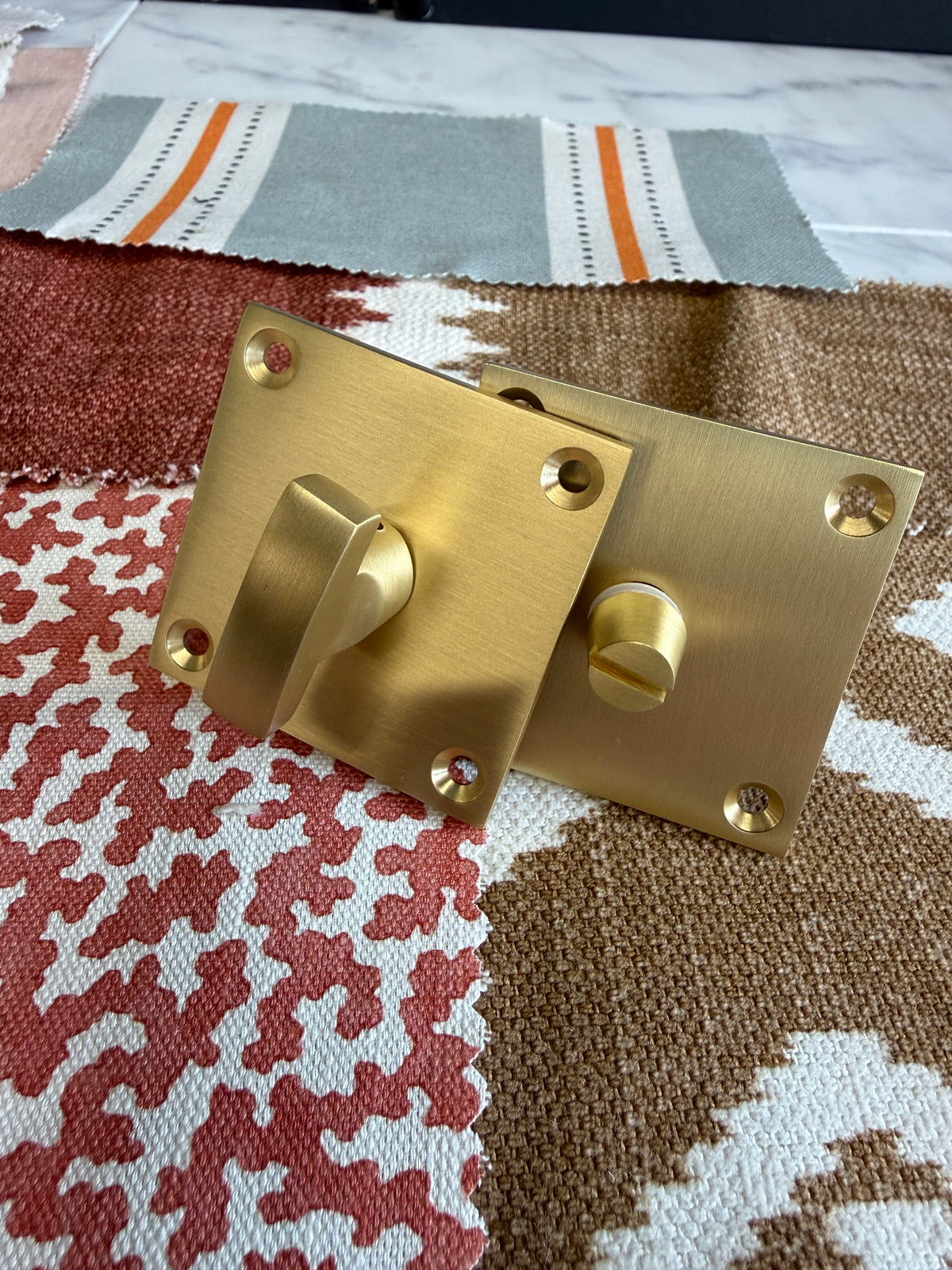 Satin brass flat plate bathroom turn and release