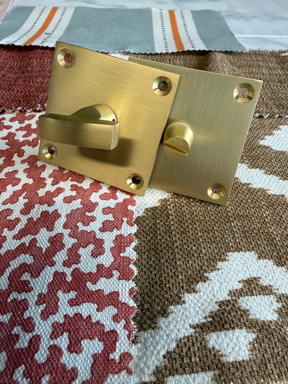 Satin brass flat plate bathroom turn and release