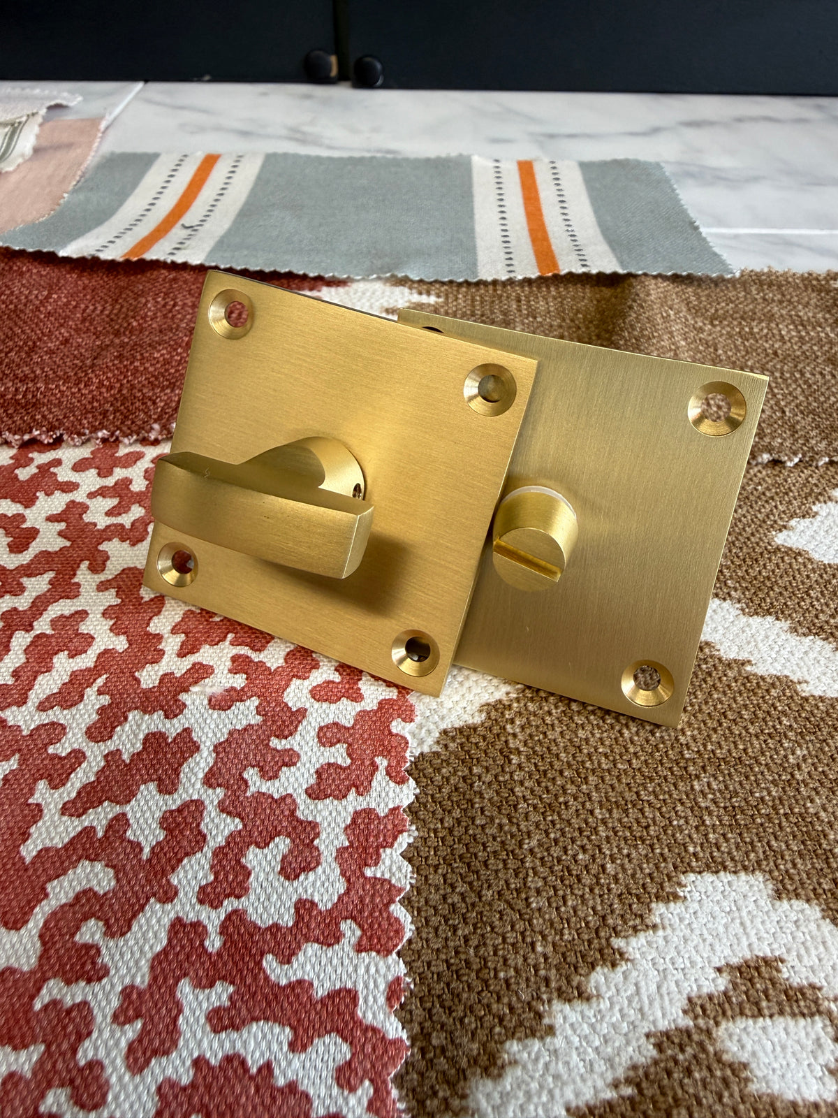 Satin brass flat plate bathroom turn and release