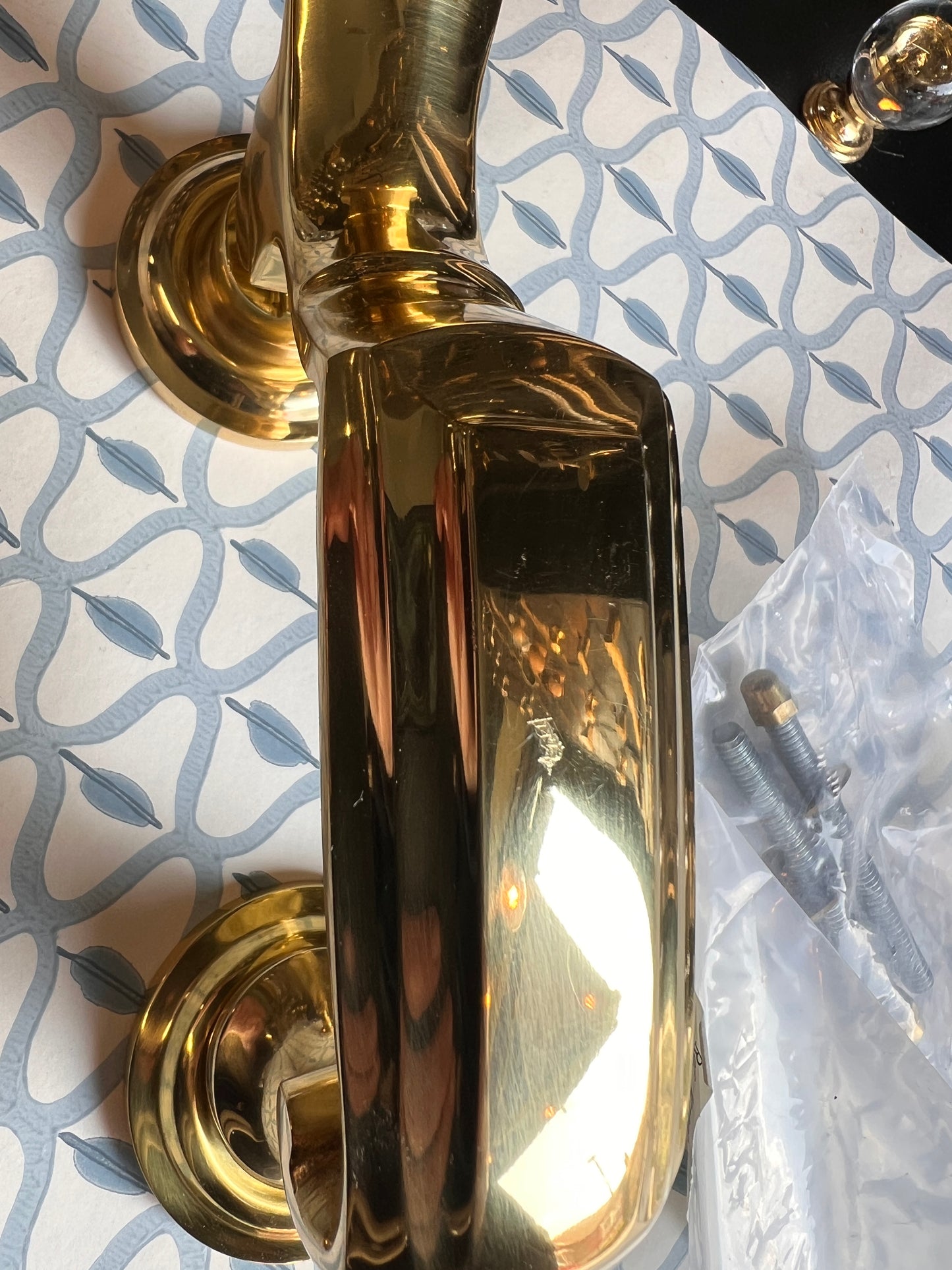 Polished brass heavy duty door knocker slight mark