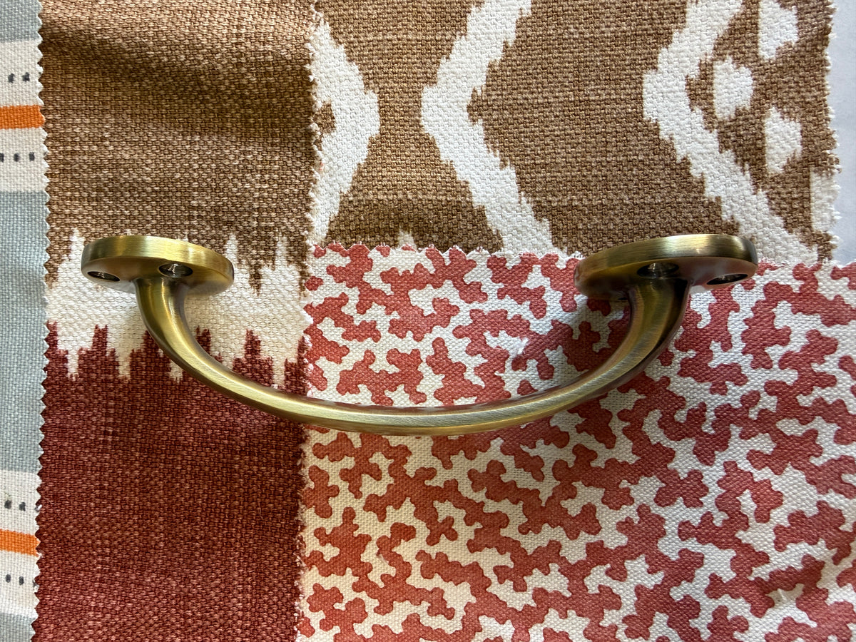 Antique brass bow handle