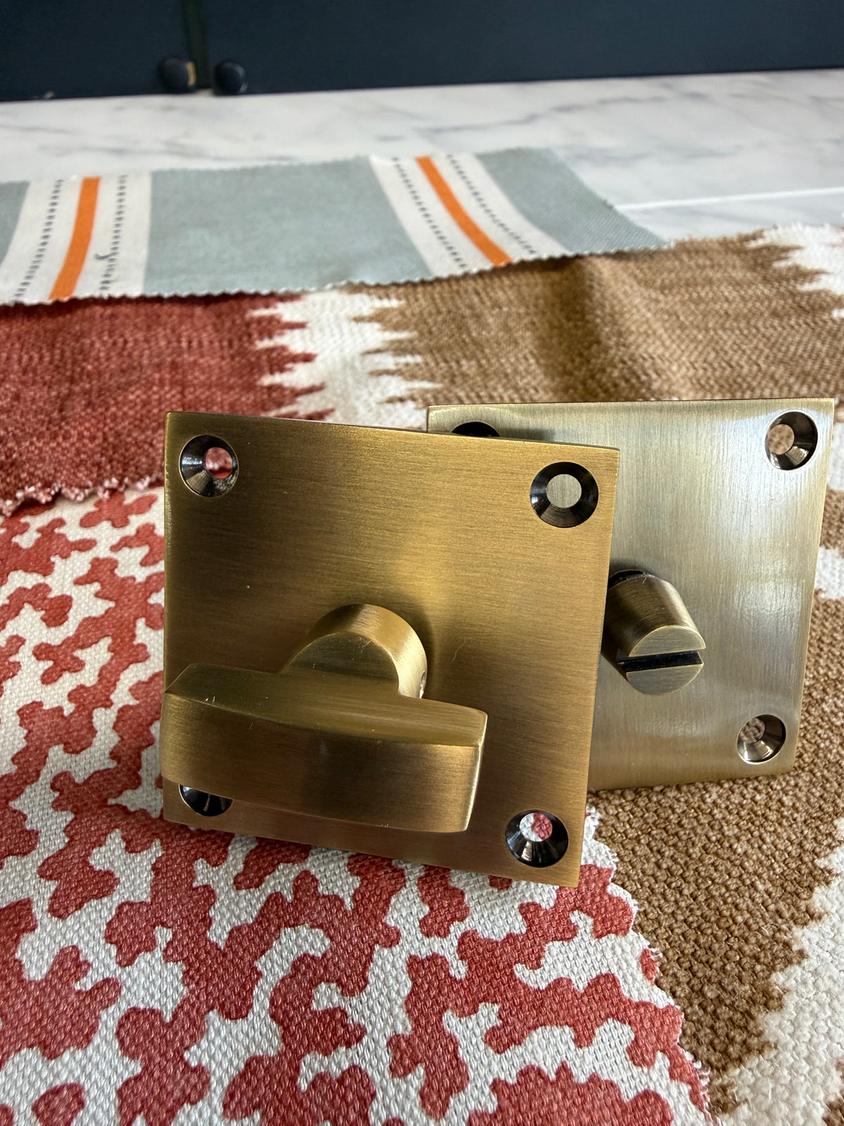 Antique brass flat plate bathroom turn and release