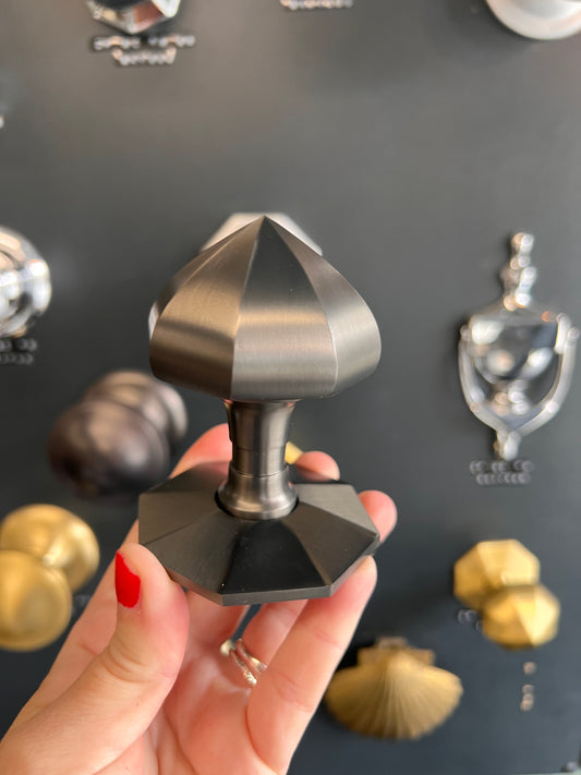 Matt bronze faceted centre door knob