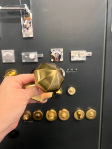 Antique brass faceted centre door knob