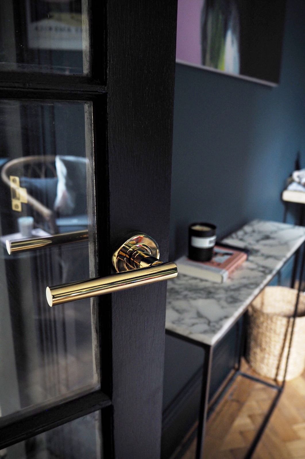 Polished brass lever on rose