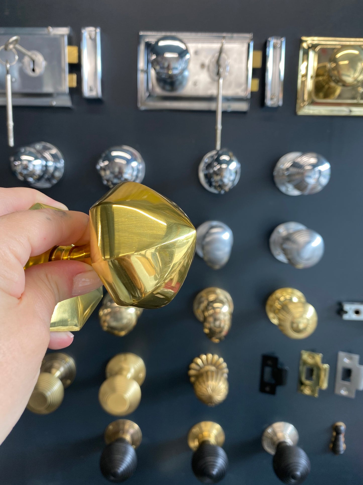 Faceted centre door knob polished brass