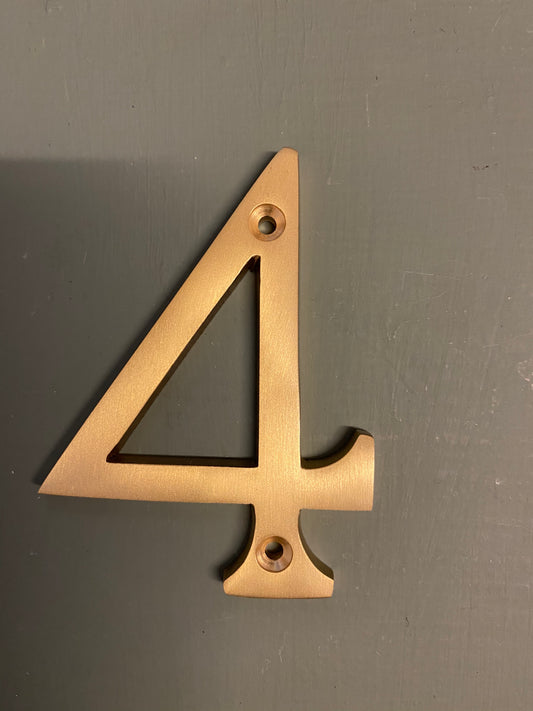 Satin brass numeral “4”