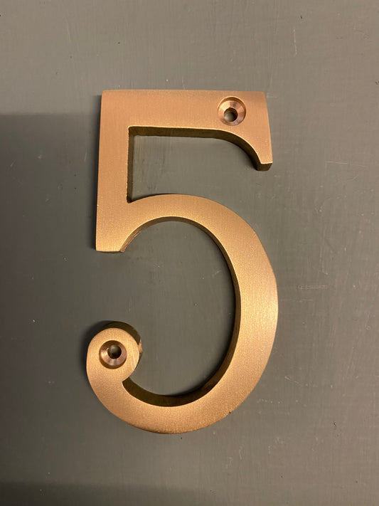 Satin brass numeral “5”