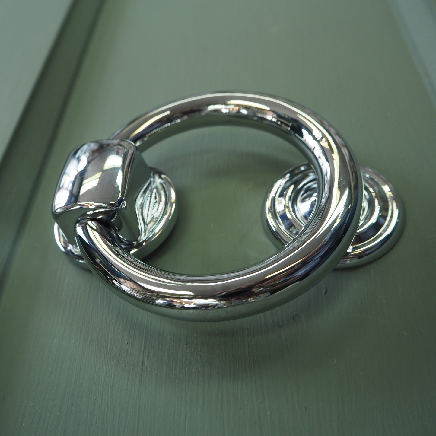 Polished chrome ring knocker