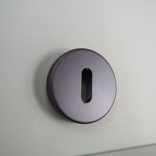 Matt black escutcheon