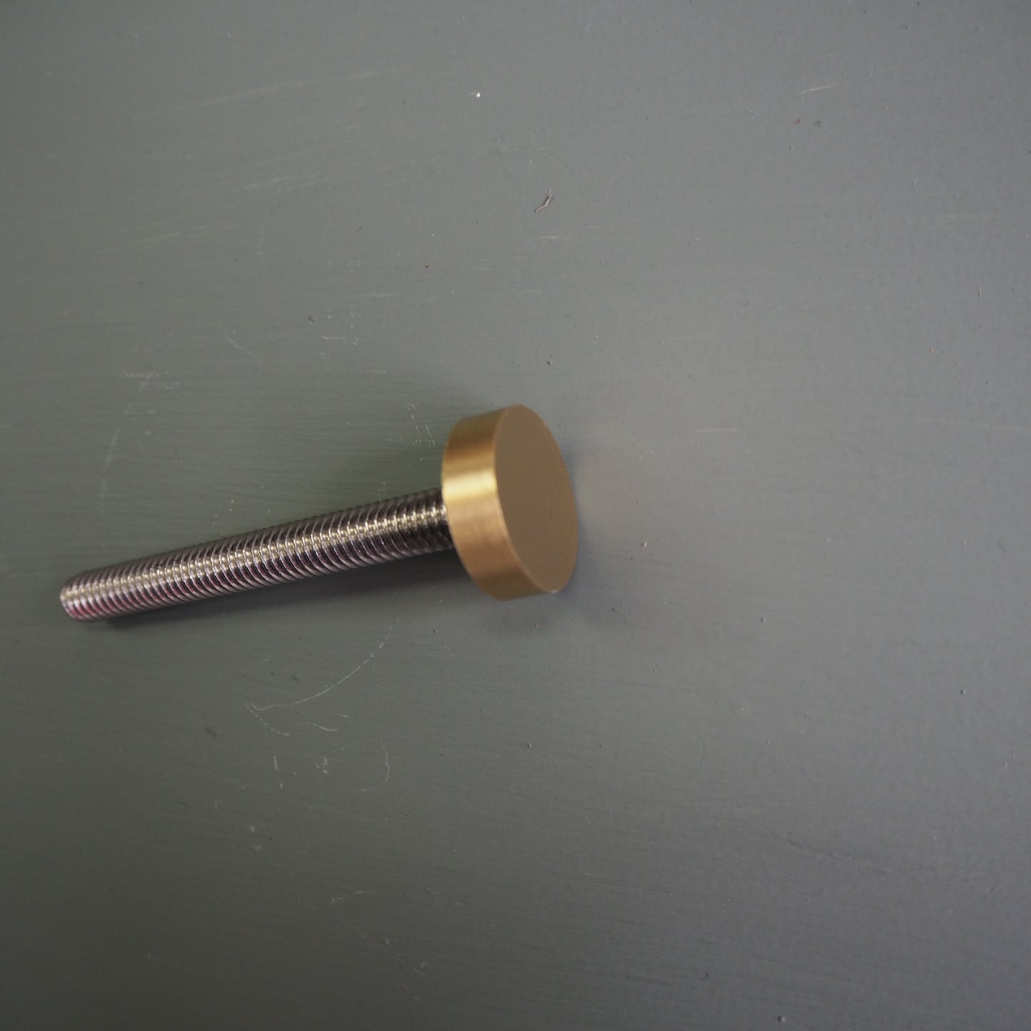 Satin brass faceted centre door knob